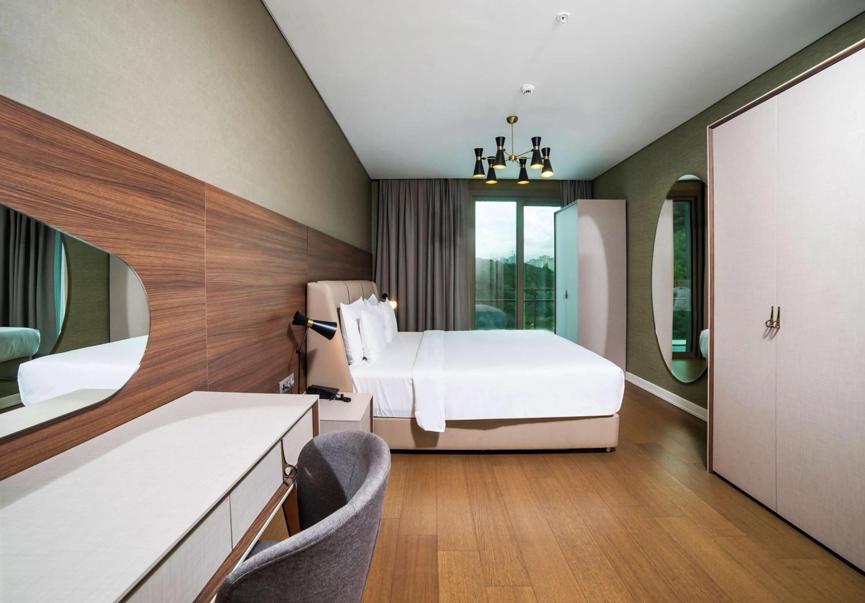 Photo of the whole room, Bed in Radisson Residences Vadistanbul