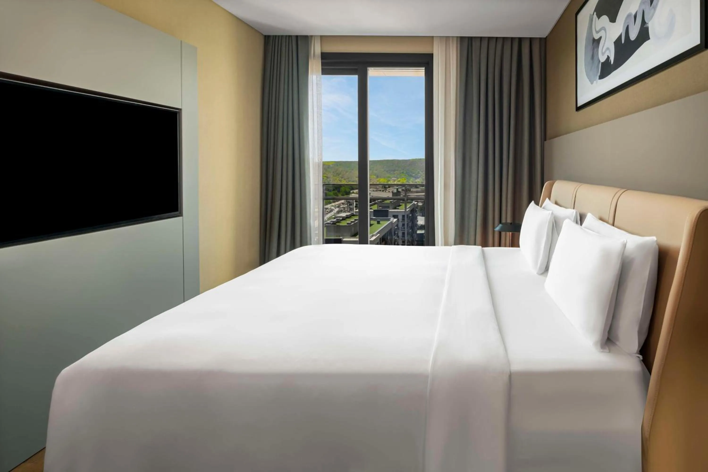 Bed in Radisson Residences Vadistanbul