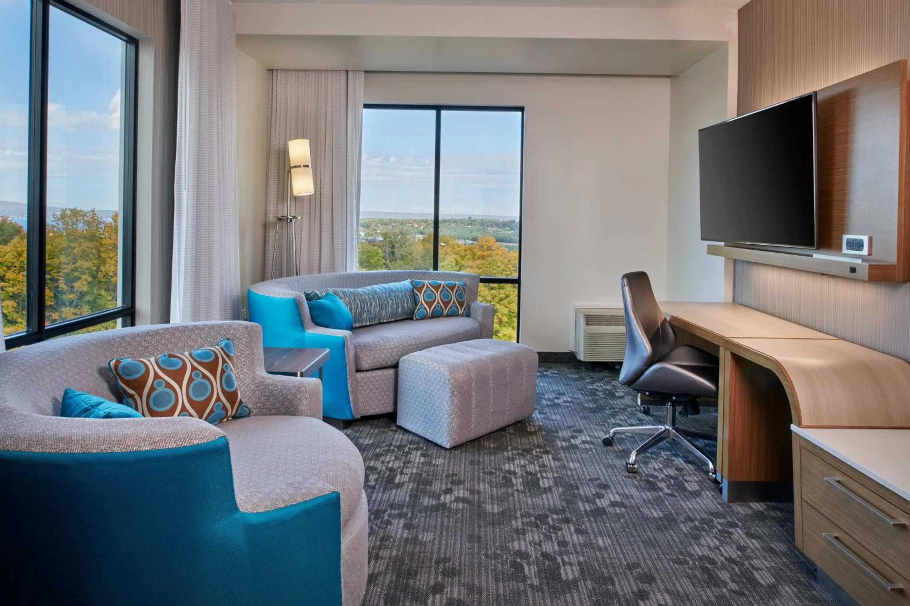 Living room in Courtyard by Marriott Petoskey at Victories Square