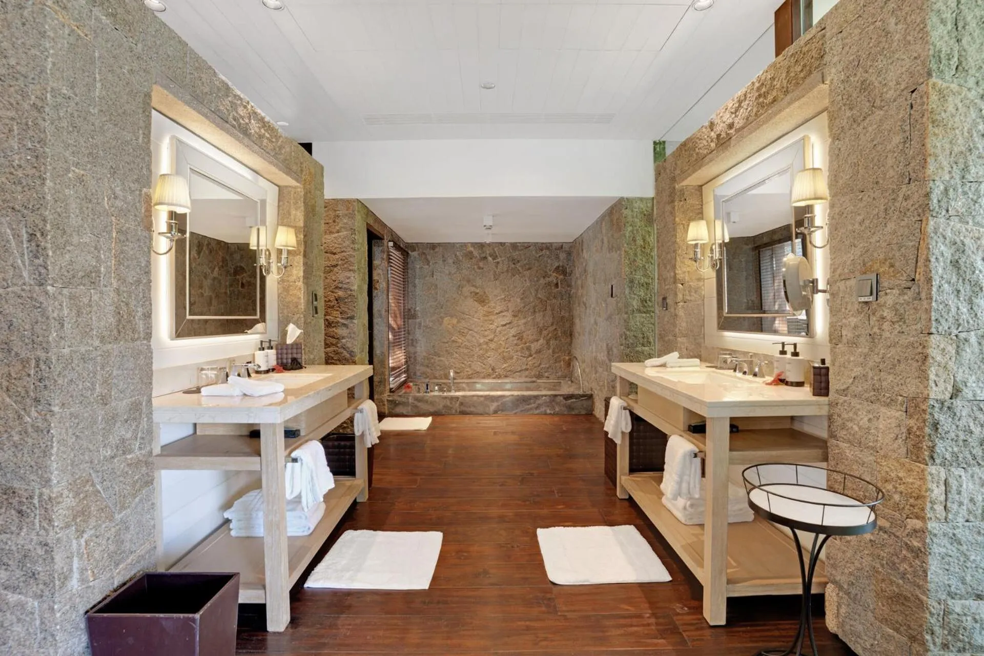 Bathroom, Bed in Four Seasons Resort Seychelles