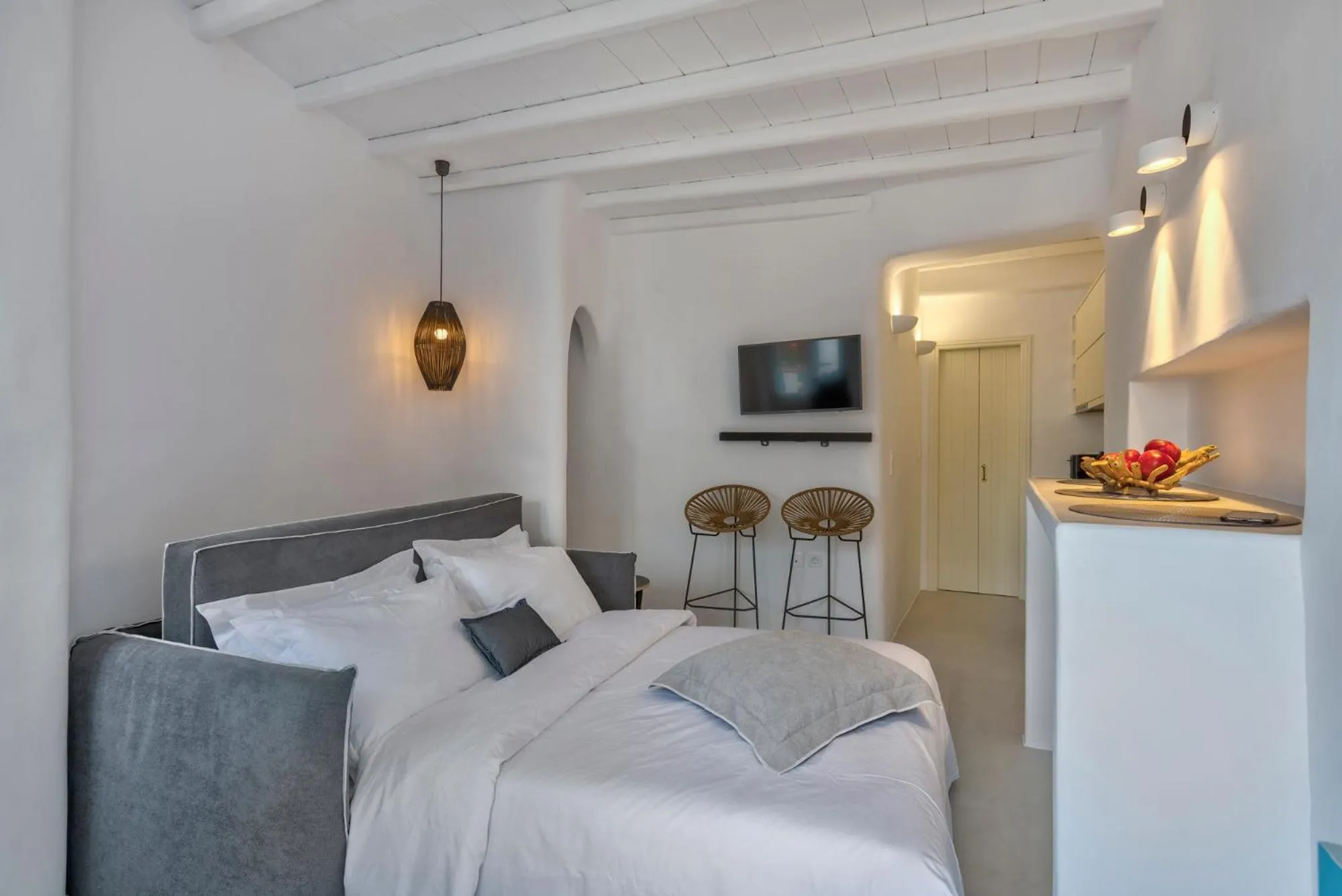 Living room, Bed in Mykonian Mews Luxury Suites