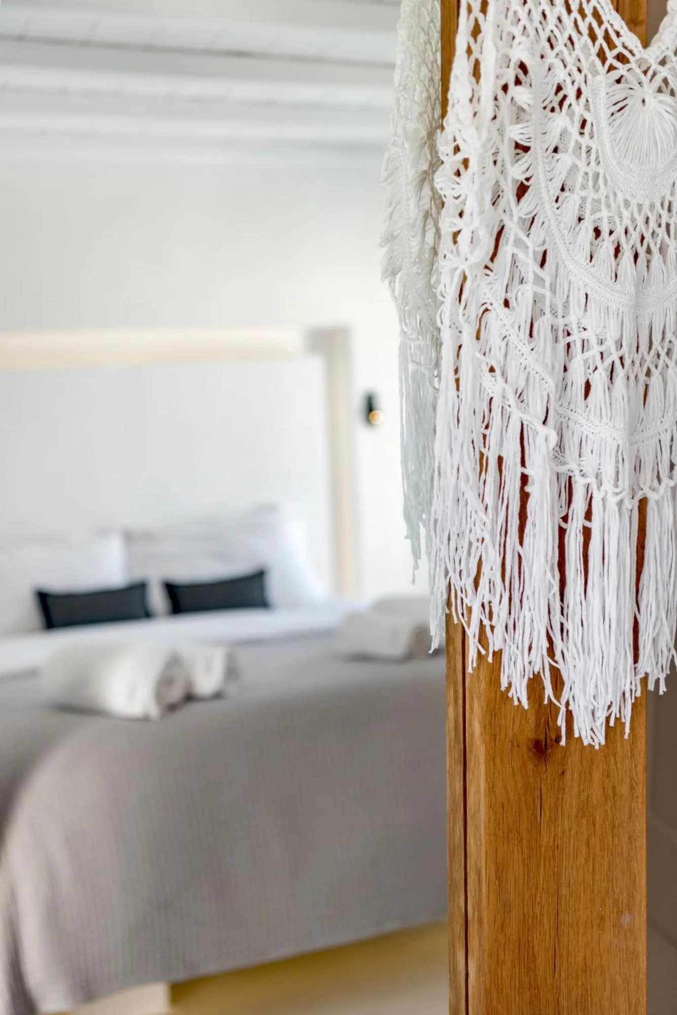 Decorative detail, Bed in Mykonian Mews Luxury Suites