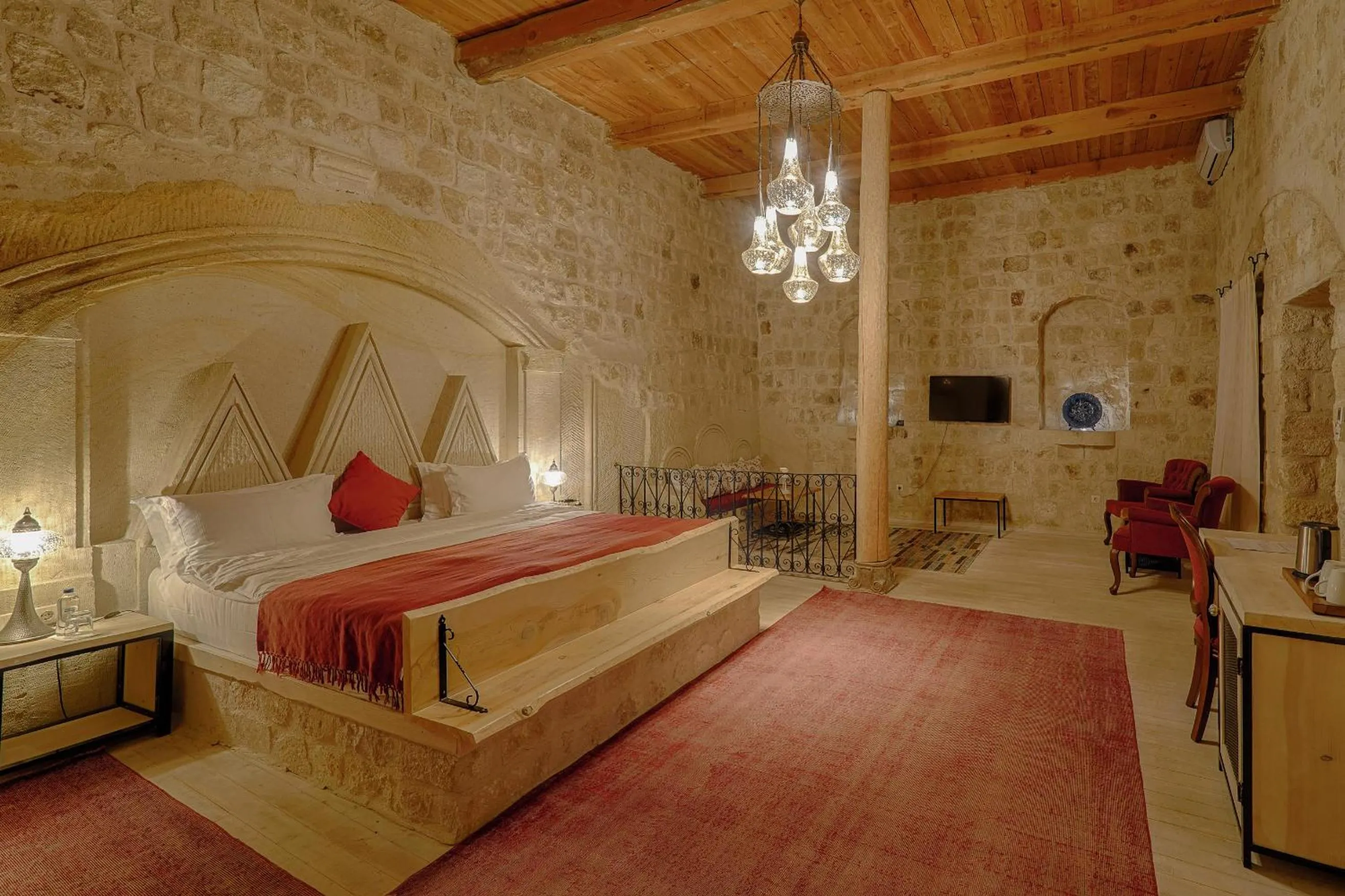 Bed in Taru Cave Suites