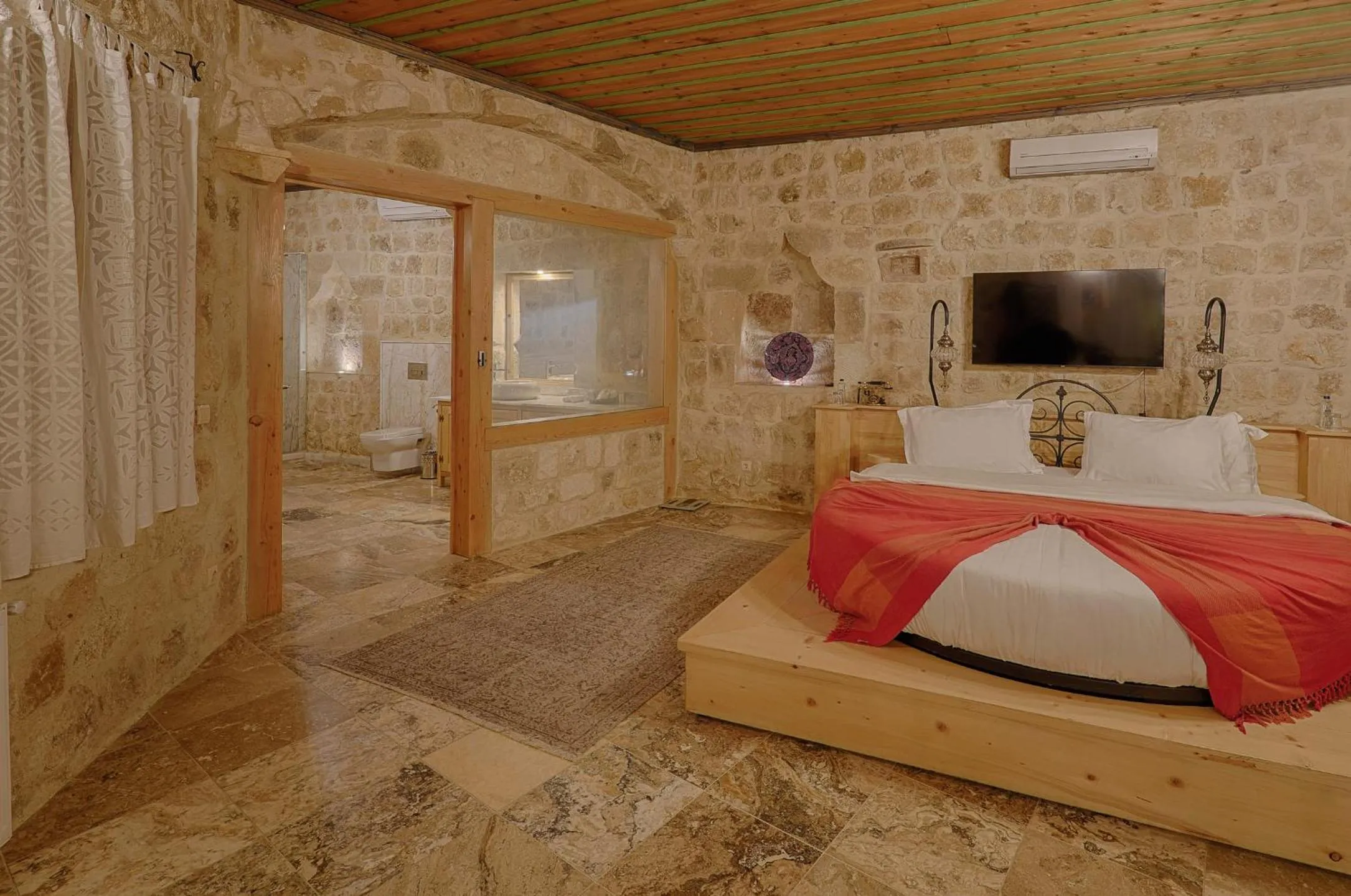Bed in Taru Cave Suites