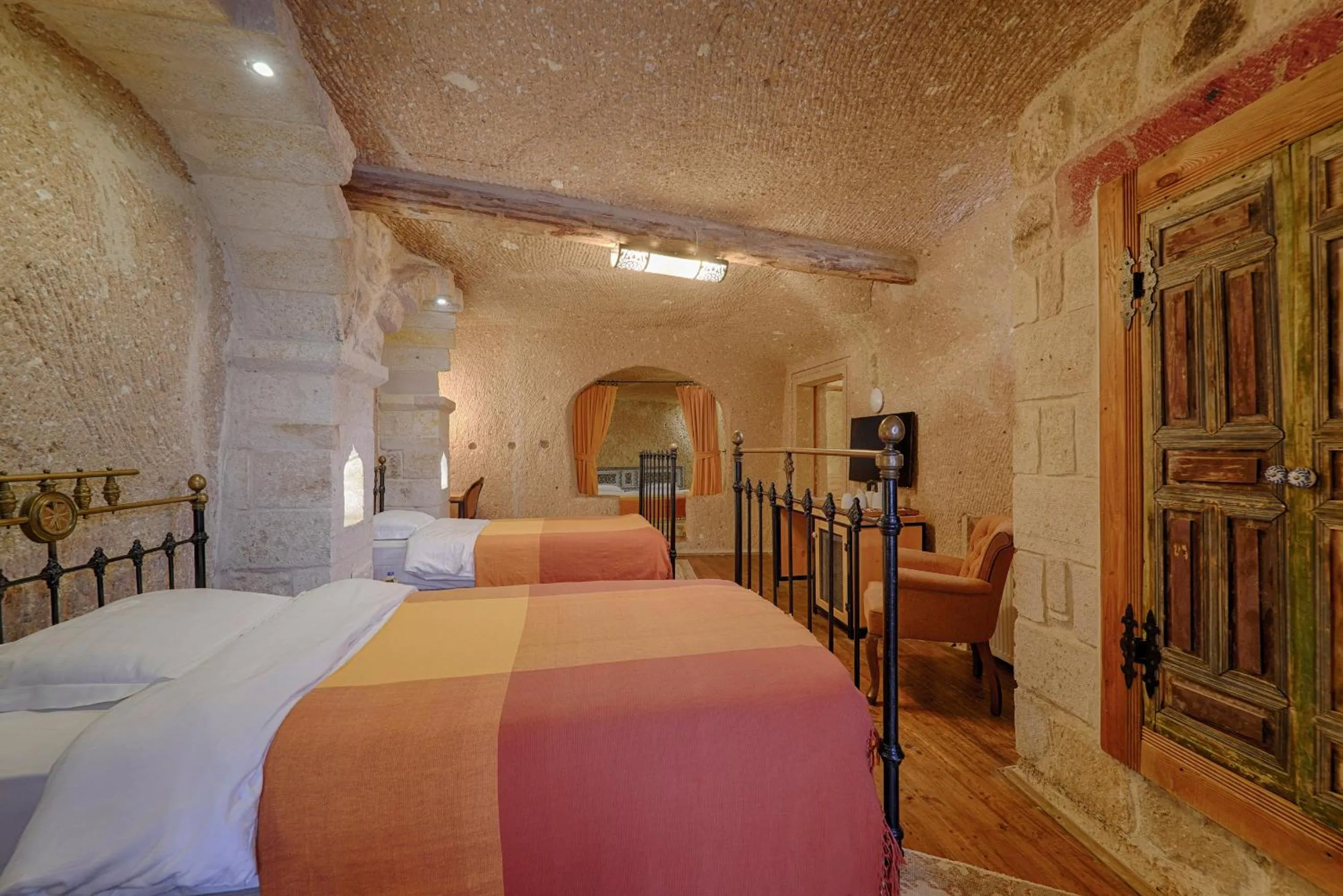 Bed in Taru Cave Suites
