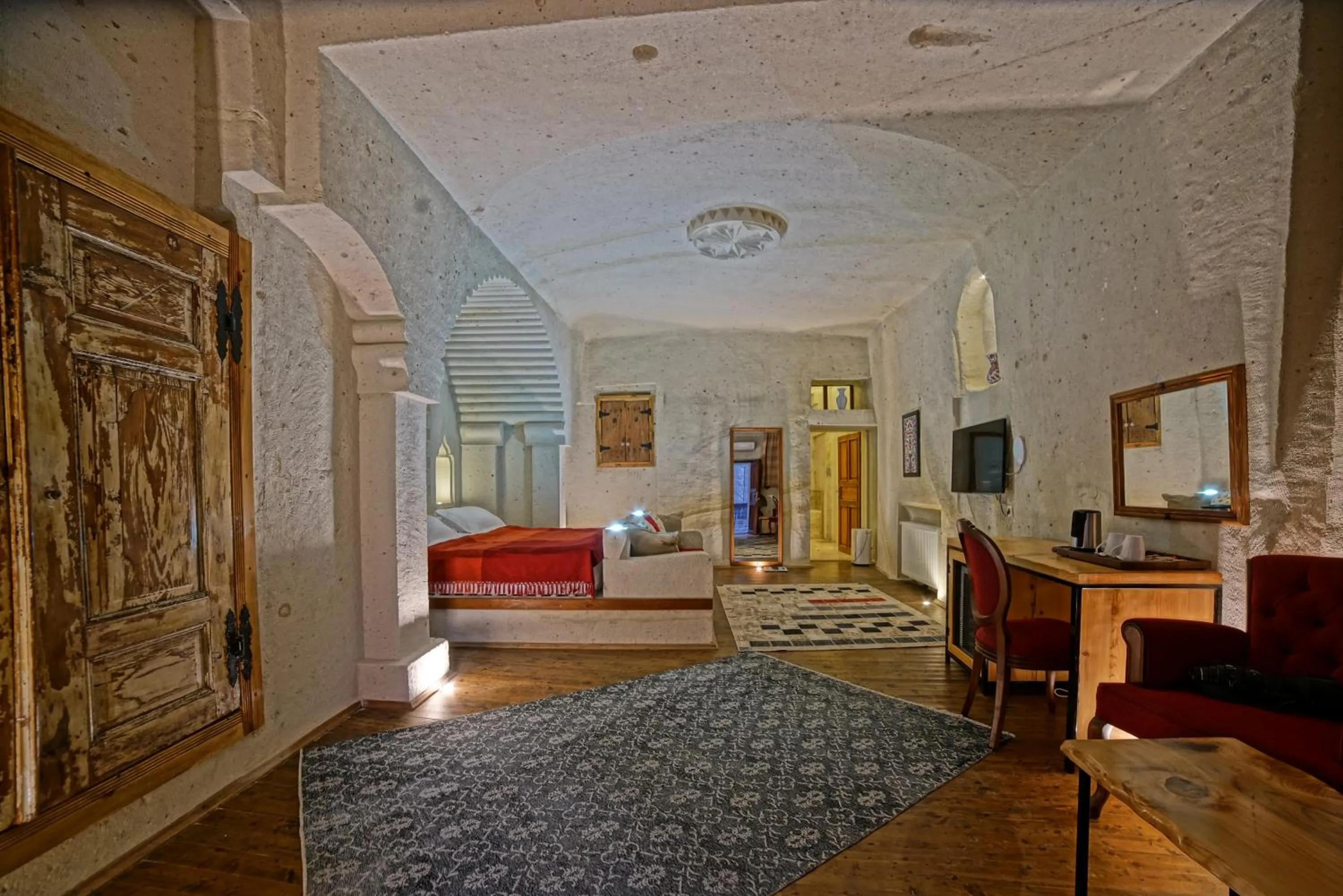 Bed in Taru Cave Suites