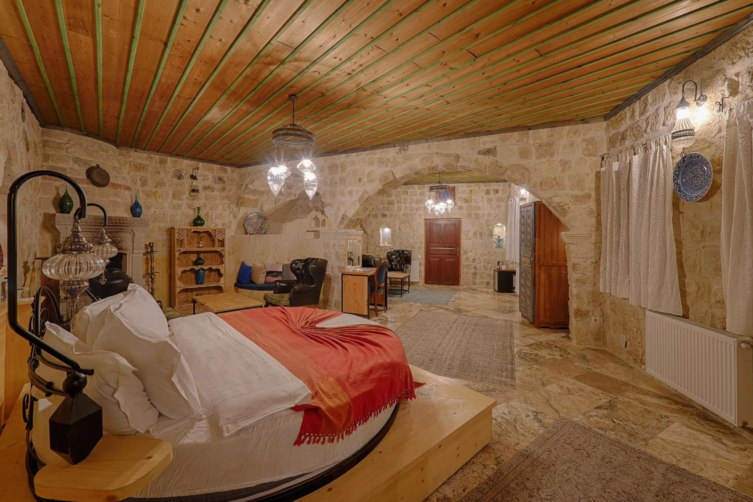 Bed in Taru Cave Suites