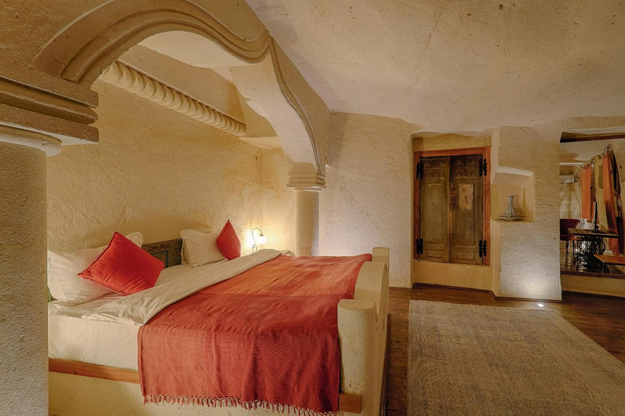 Bed in Taru Cave Suites