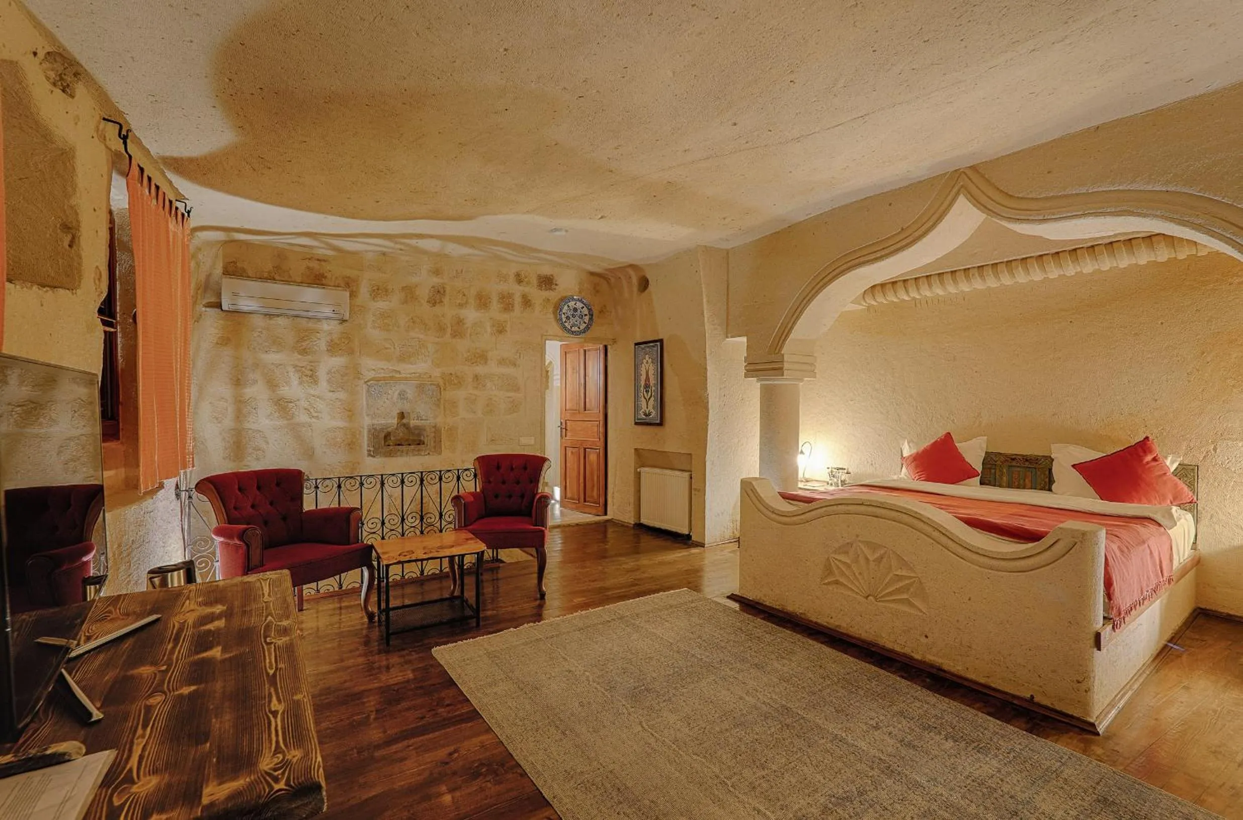 Bed in Taru Cave Suites