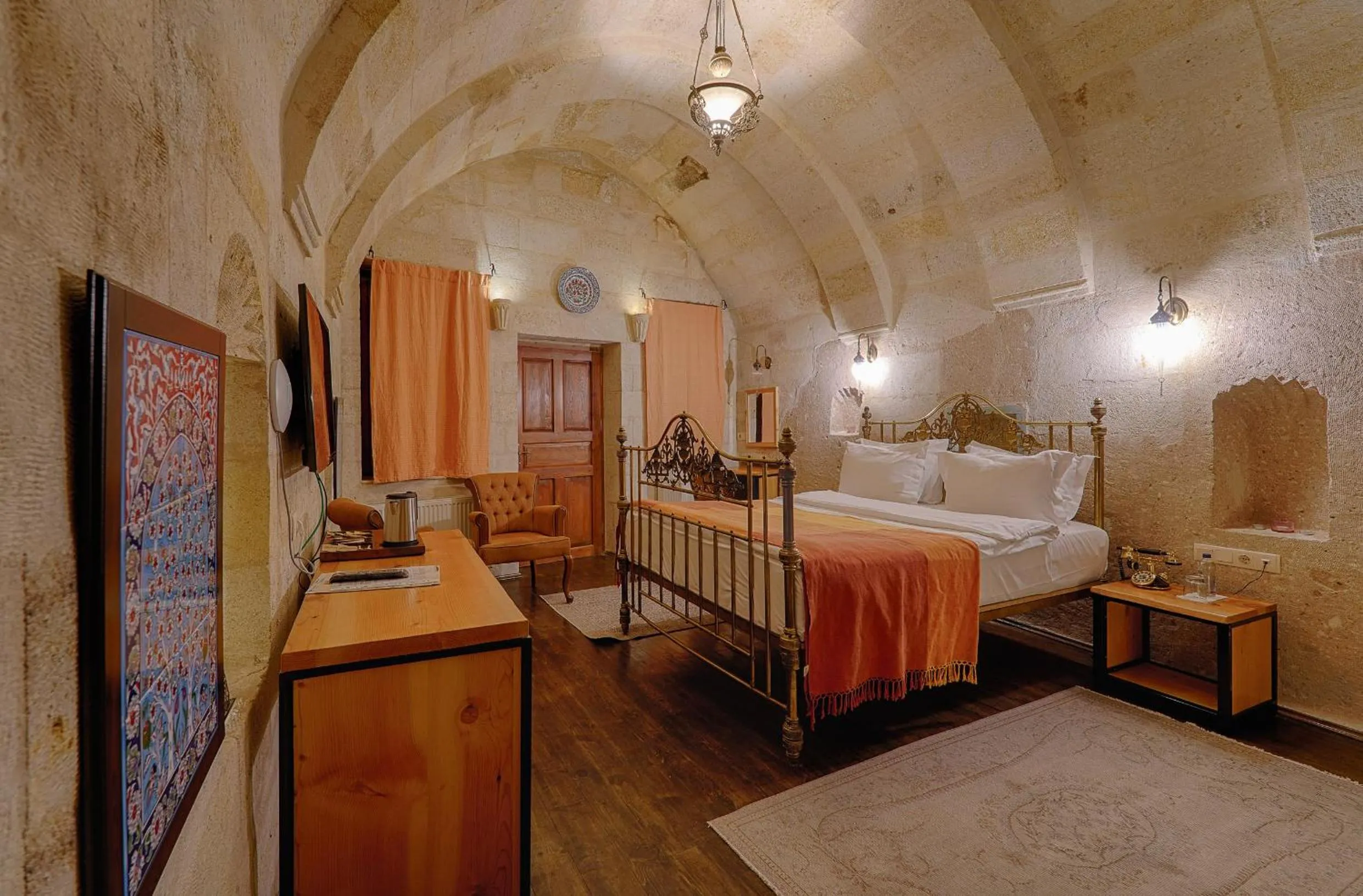 Bed in Taru Cave Suites