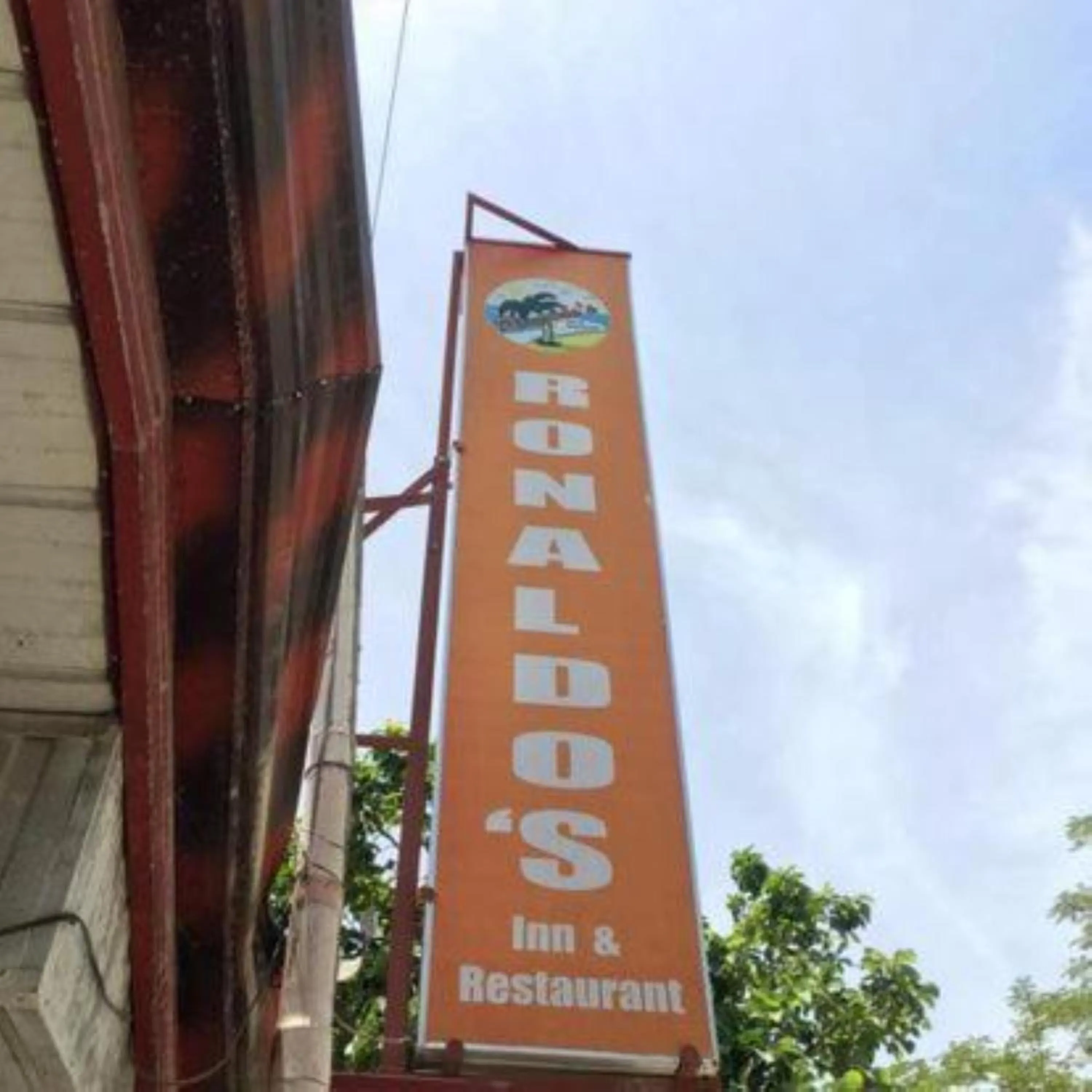 Property logo or sign in Ronaldo's Inn Siargao by Cocotel