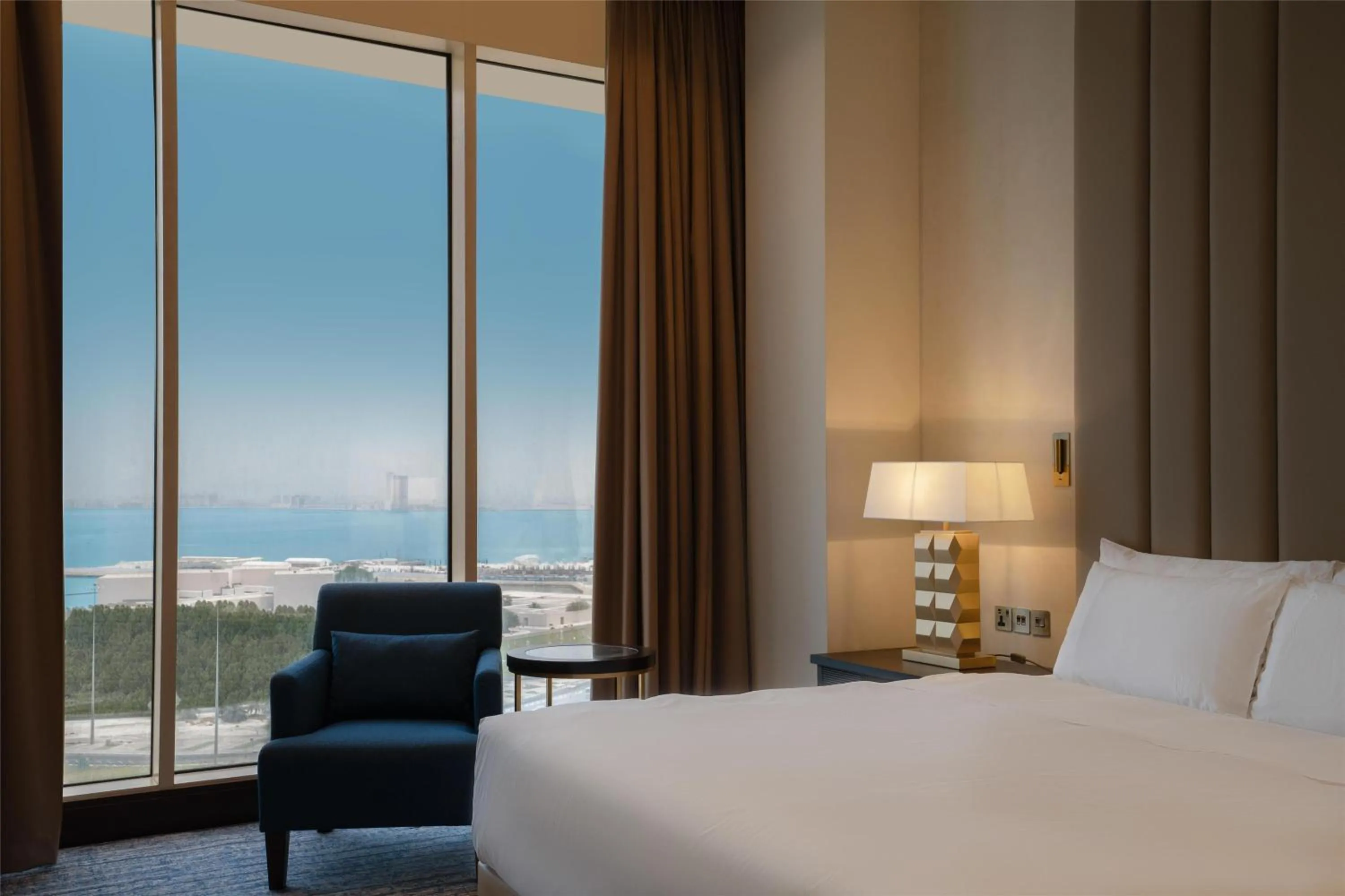 Photo of the whole room, Bed in The Diplomat Radisson Blu Hotel Residence & Spa