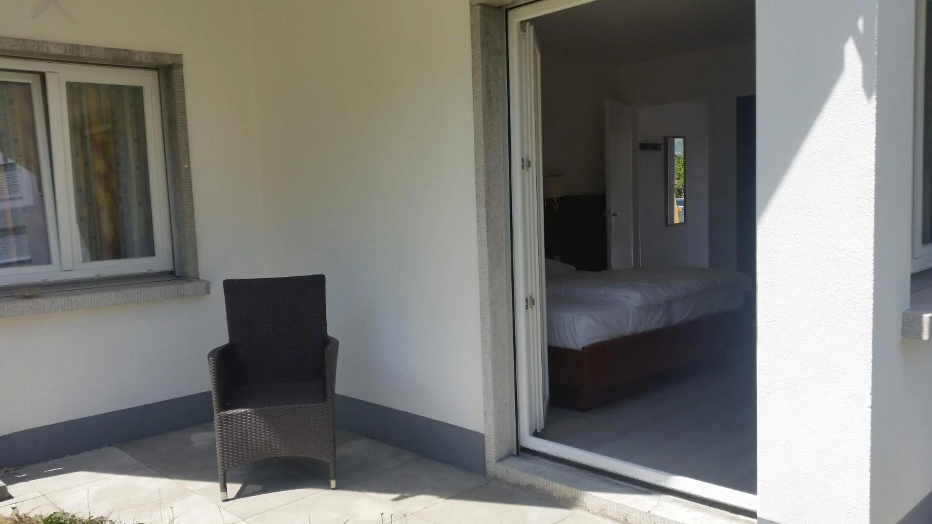 Patio, Bed in Motel des Sports Martigny