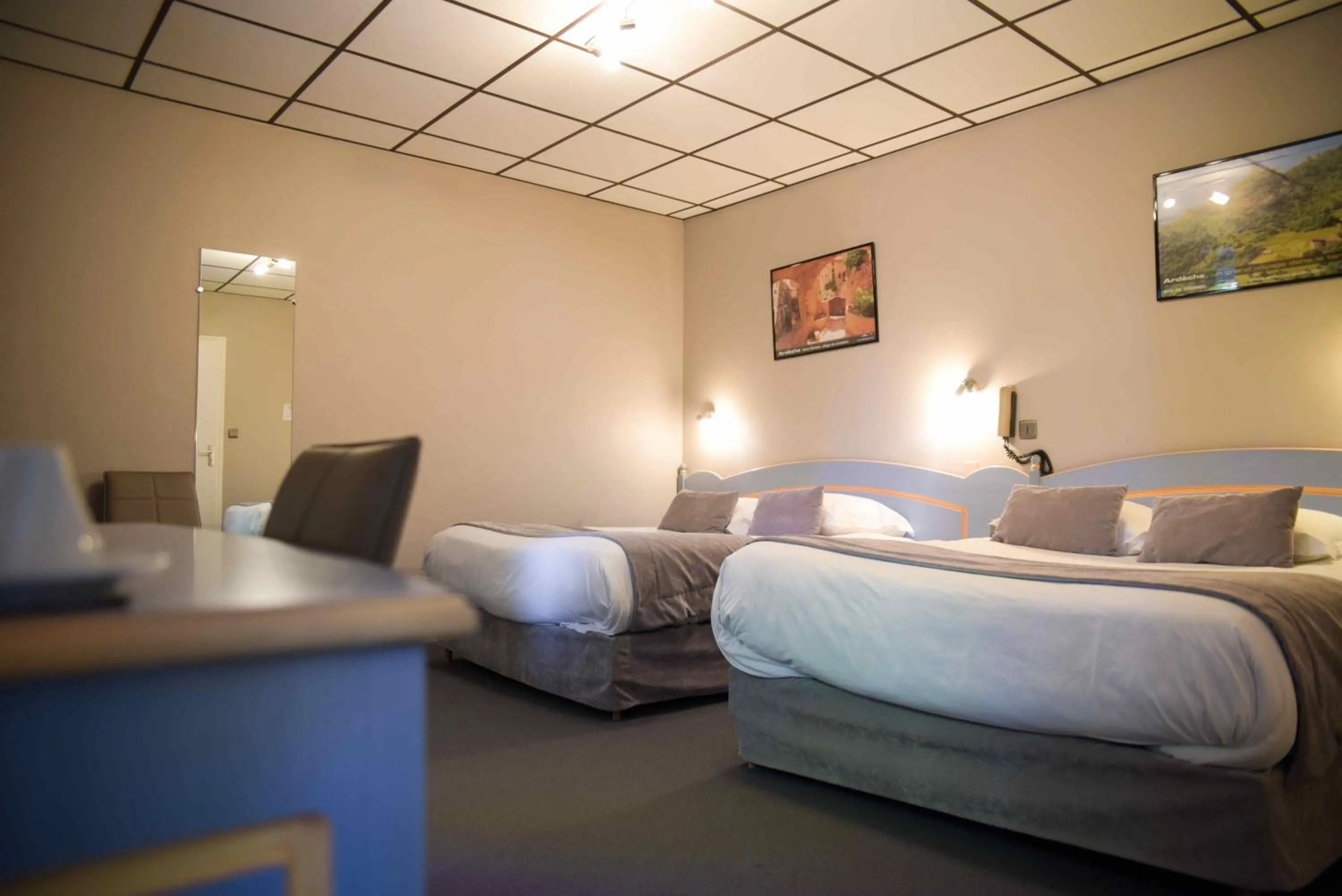 Photo of the whole room, Bed in Logis Hôtel Restaurant Azalées