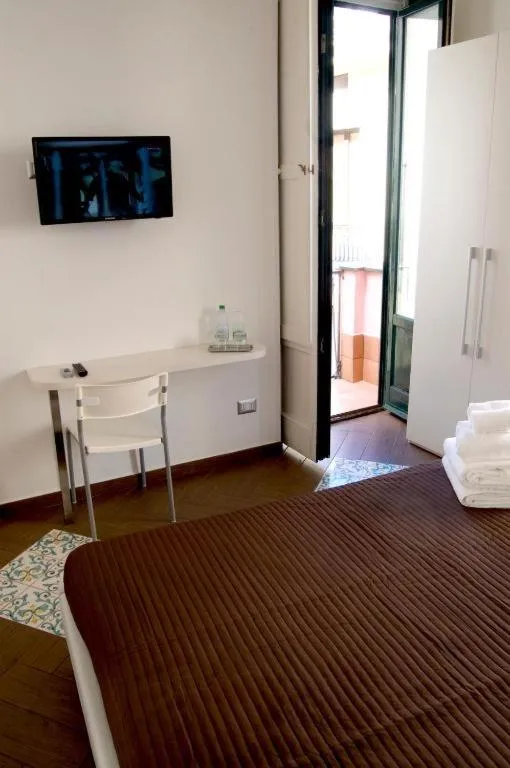 Bed in Palazzo della Poesia Casa Vacanze