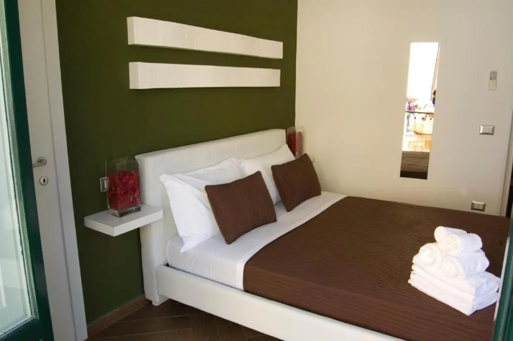 Bed in Palazzo della Poesia Casa Vacanze