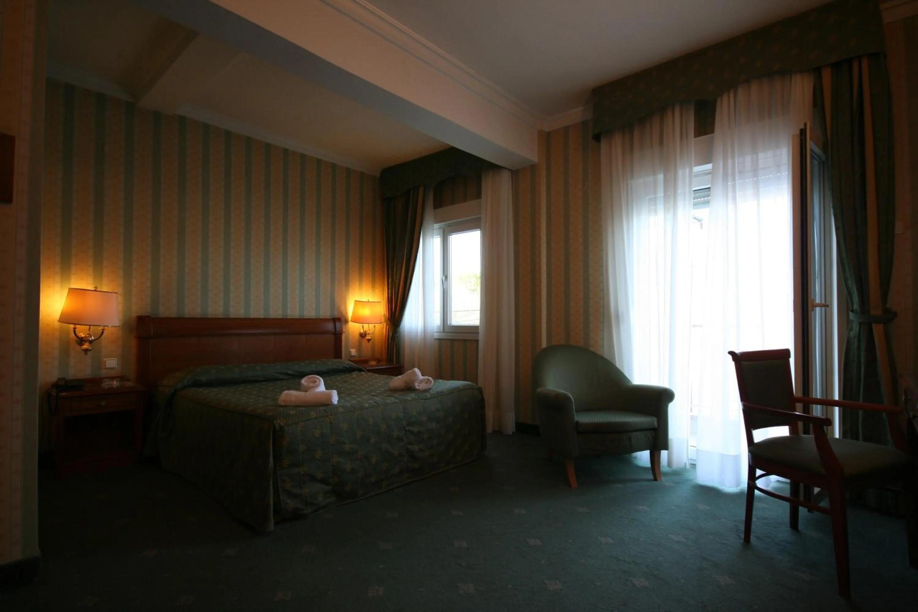 Bed in Hotel Kastoria in Kastoria City