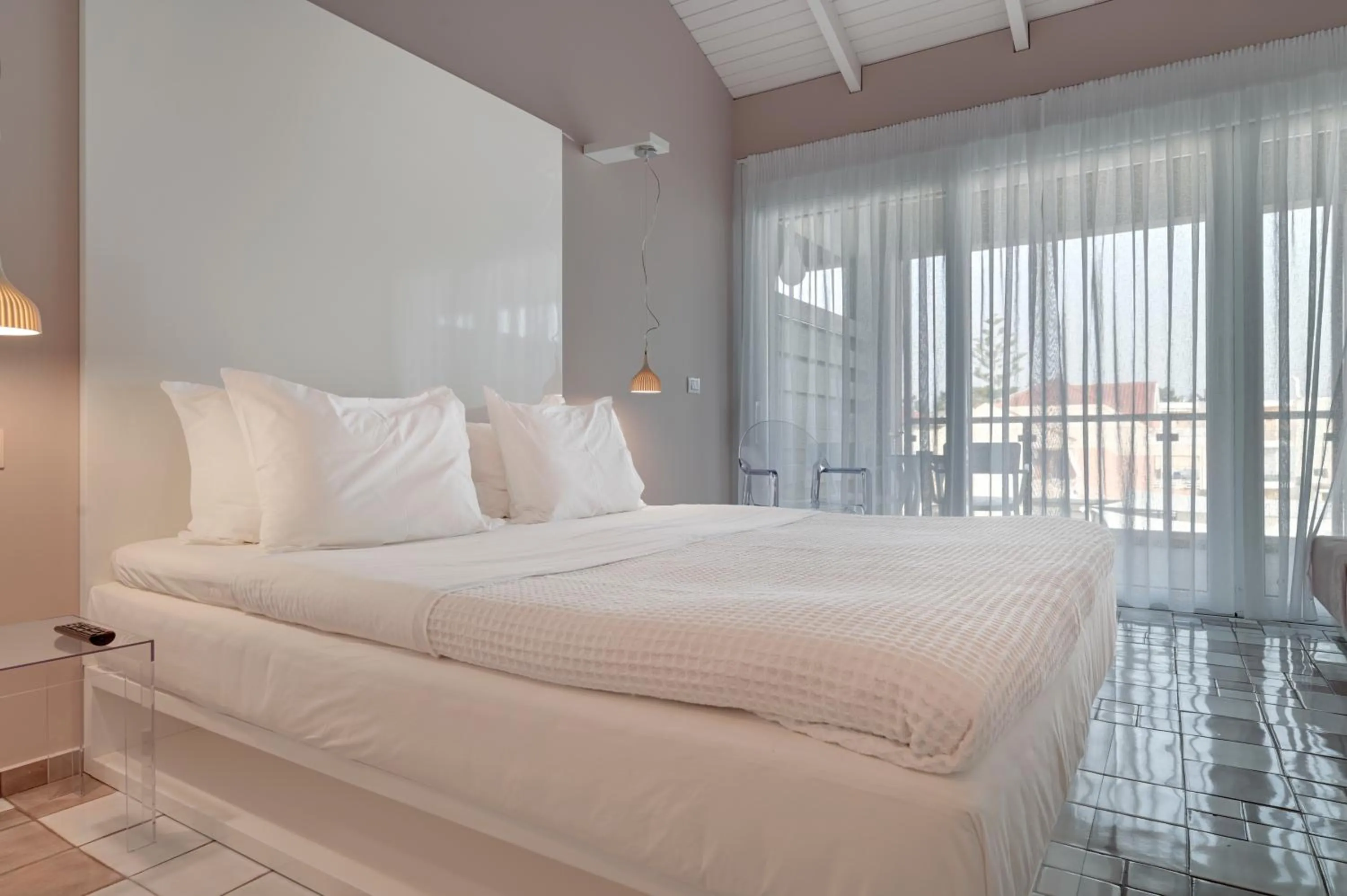 Bed in SESA Boutique Hotel & Restaurant