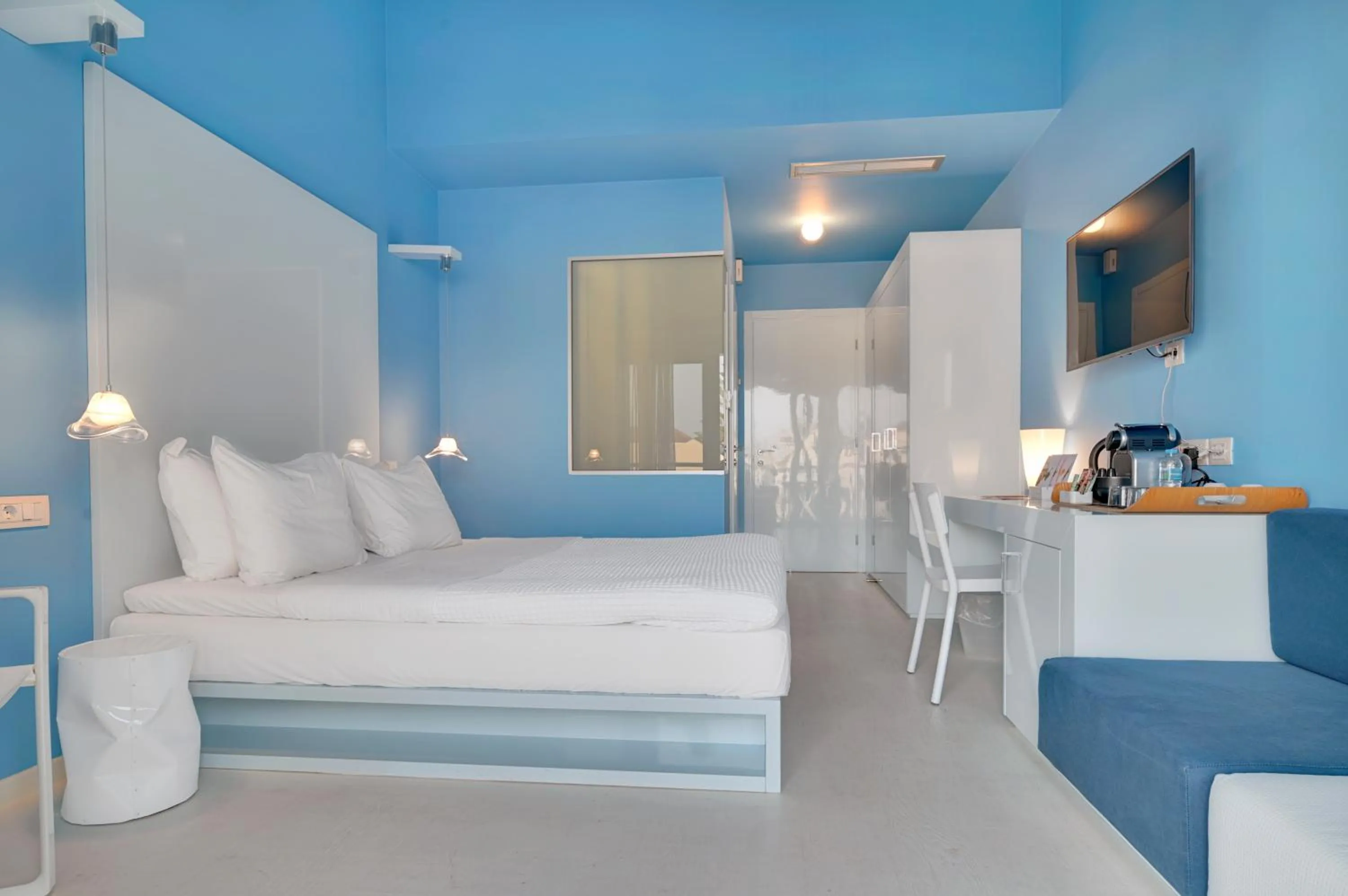 Bed in SESA Boutique Hotel & Restaurant