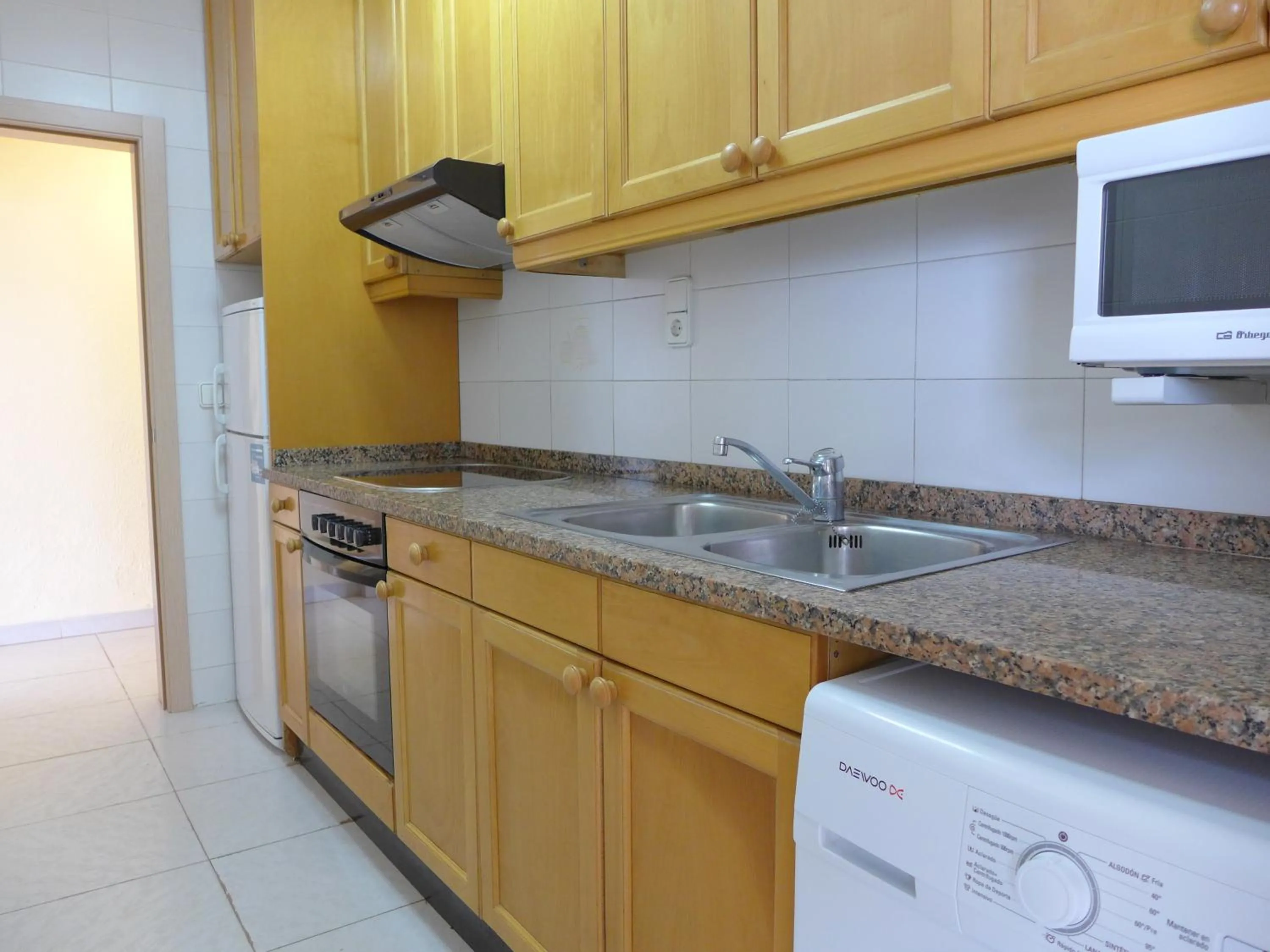 Kitchen or kitchenette in Rentalmar Family Acantilados