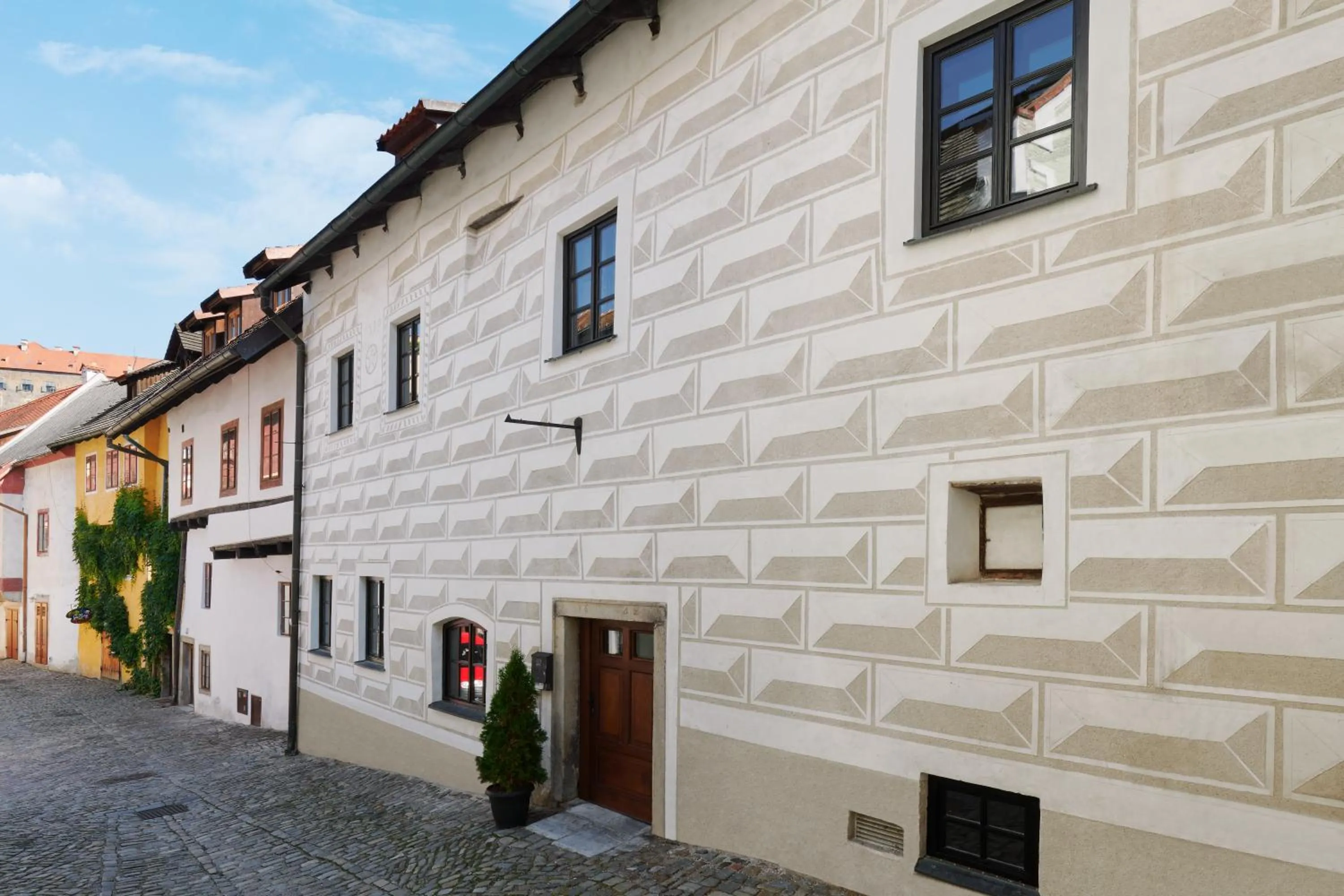 Property building in Pension Kristian by KH