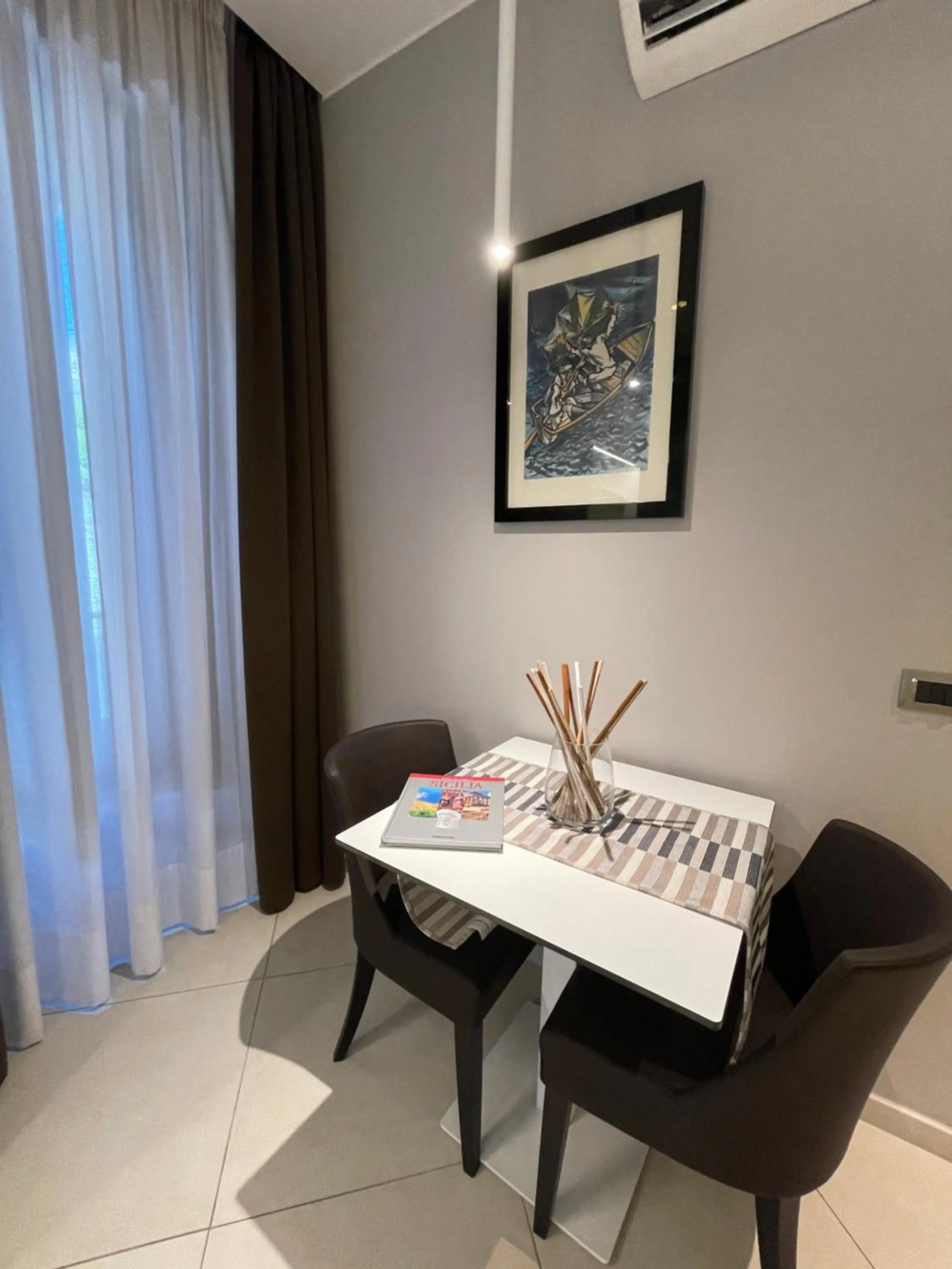 Living room in ETNEA STYLE CATANIA LUXURY ROOMS