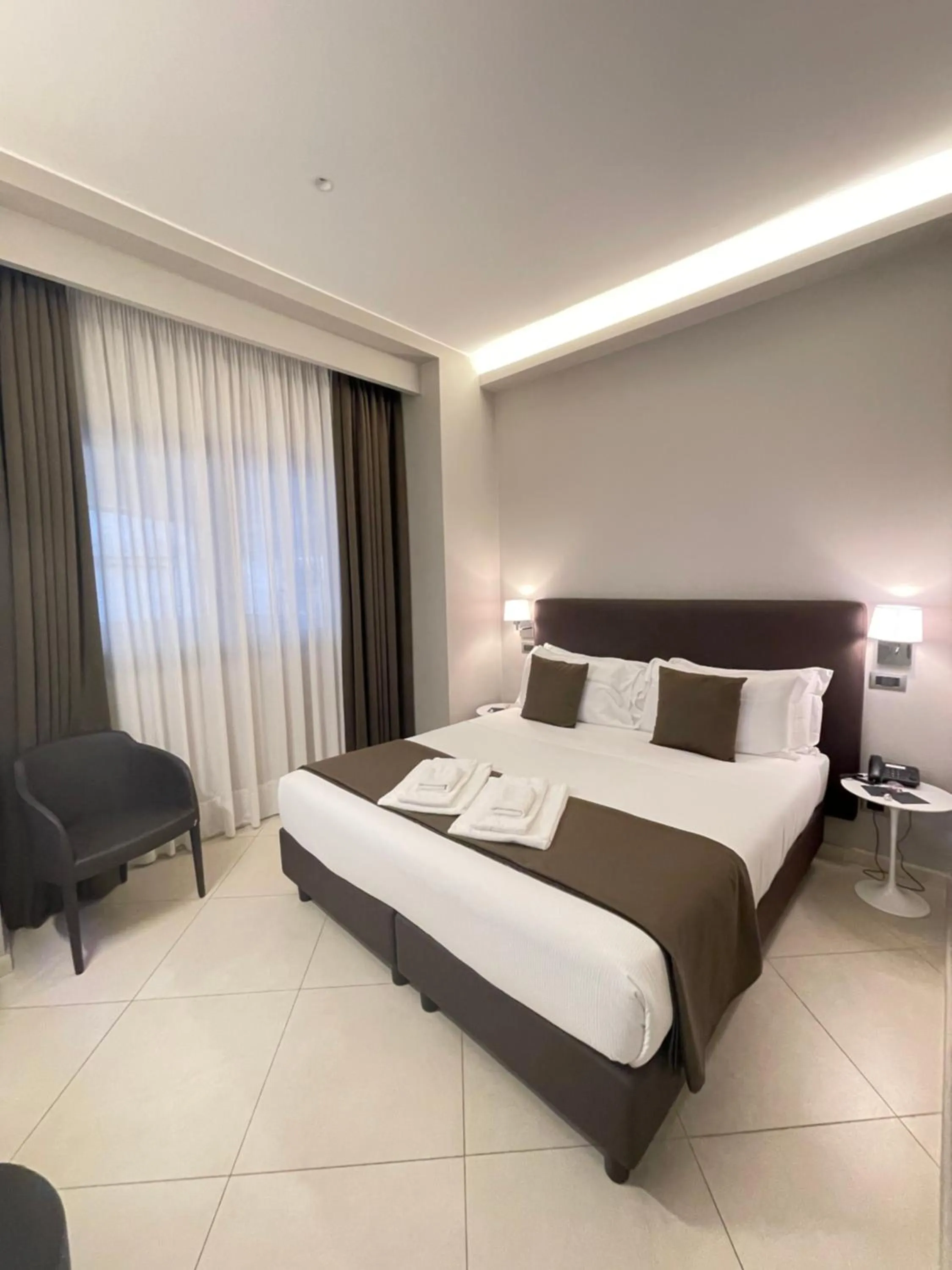 Inner courtyard view, Bed in ETNEA STYLE CATANIA LUXURY ROOMS