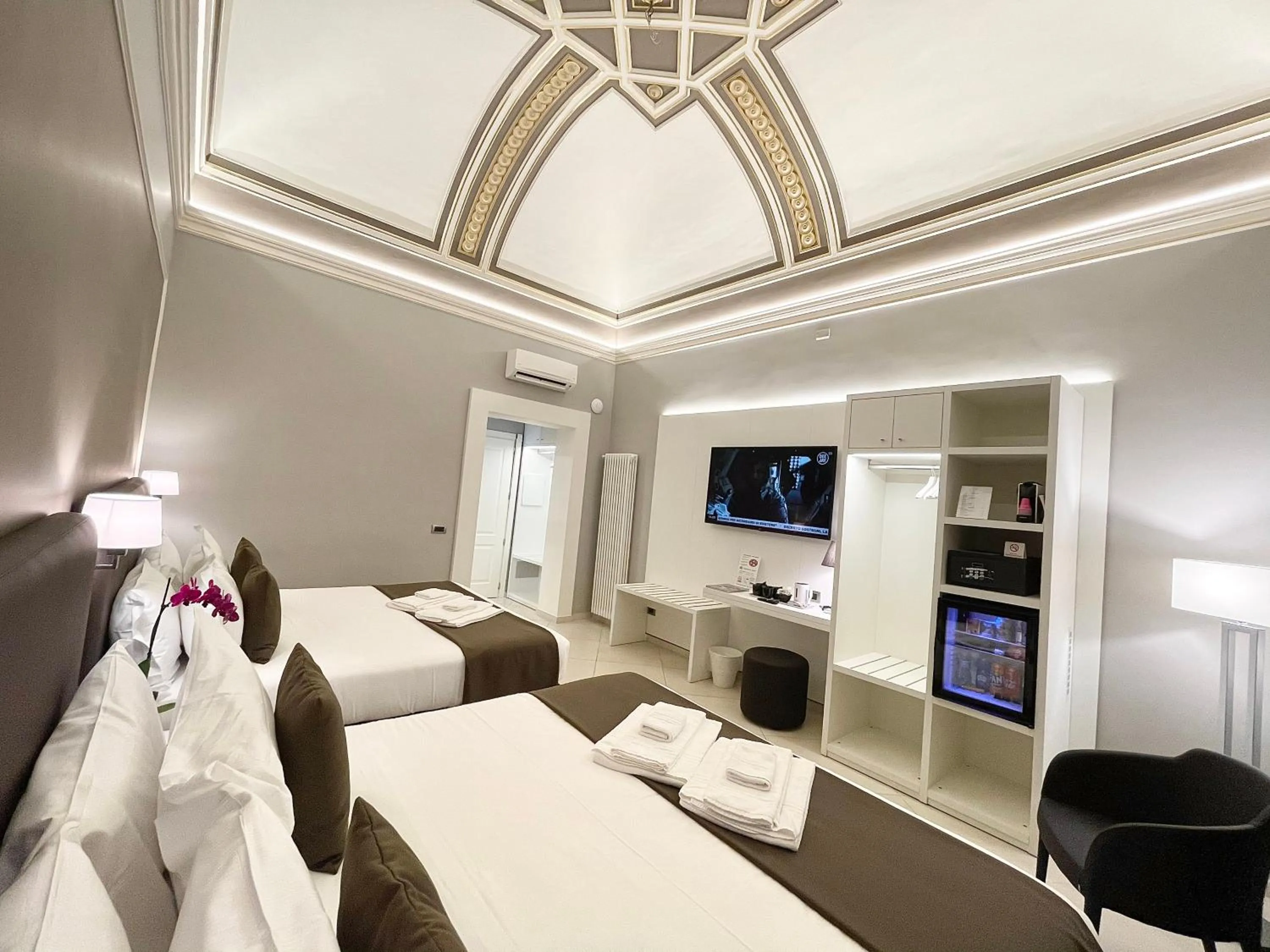 Bed in ETNEA STYLE CATANIA LUXURY ROOMS