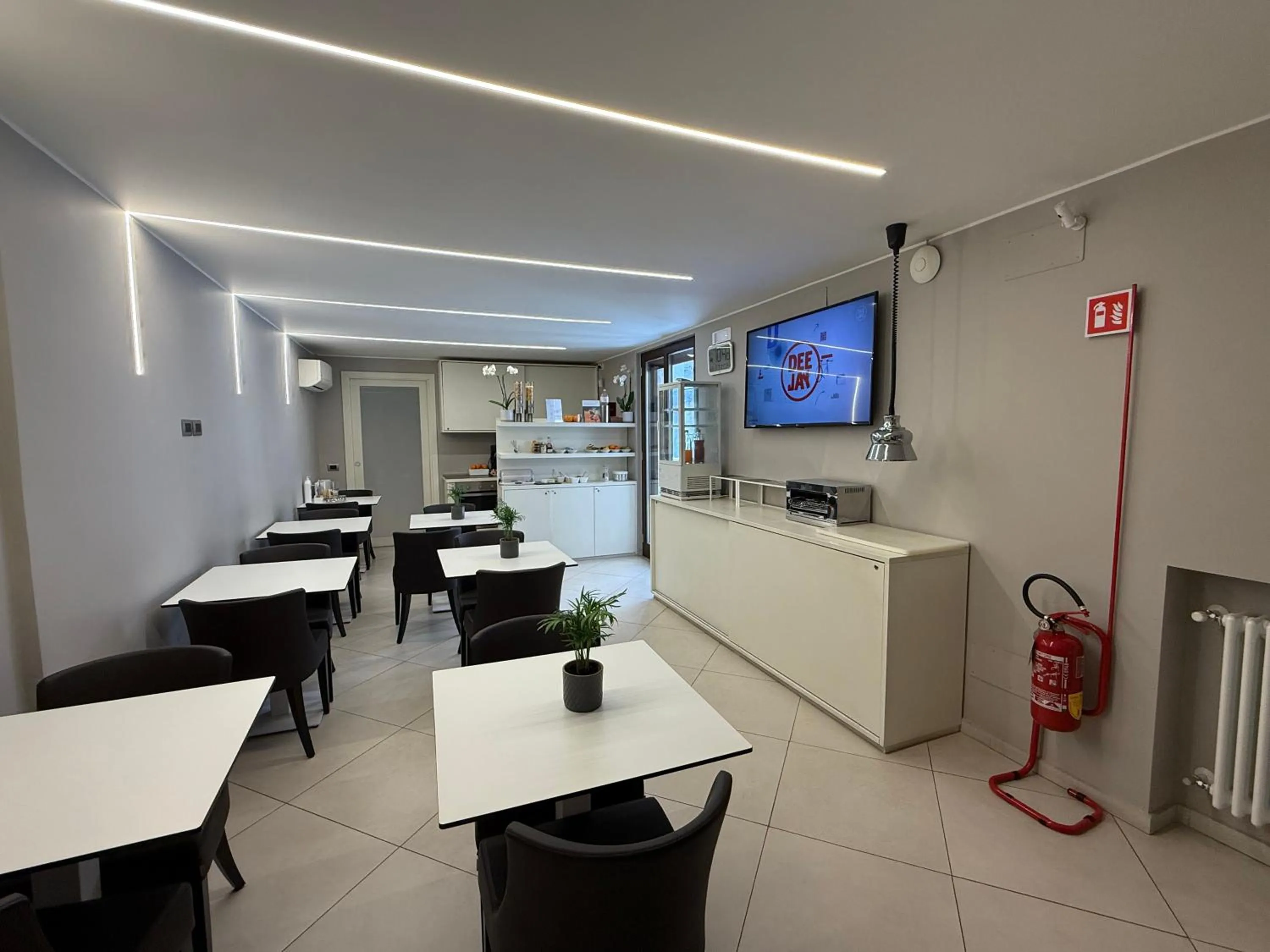 Communal lounge/ TV room in ETNEA STYLE CATANIA LUXURY ROOMS