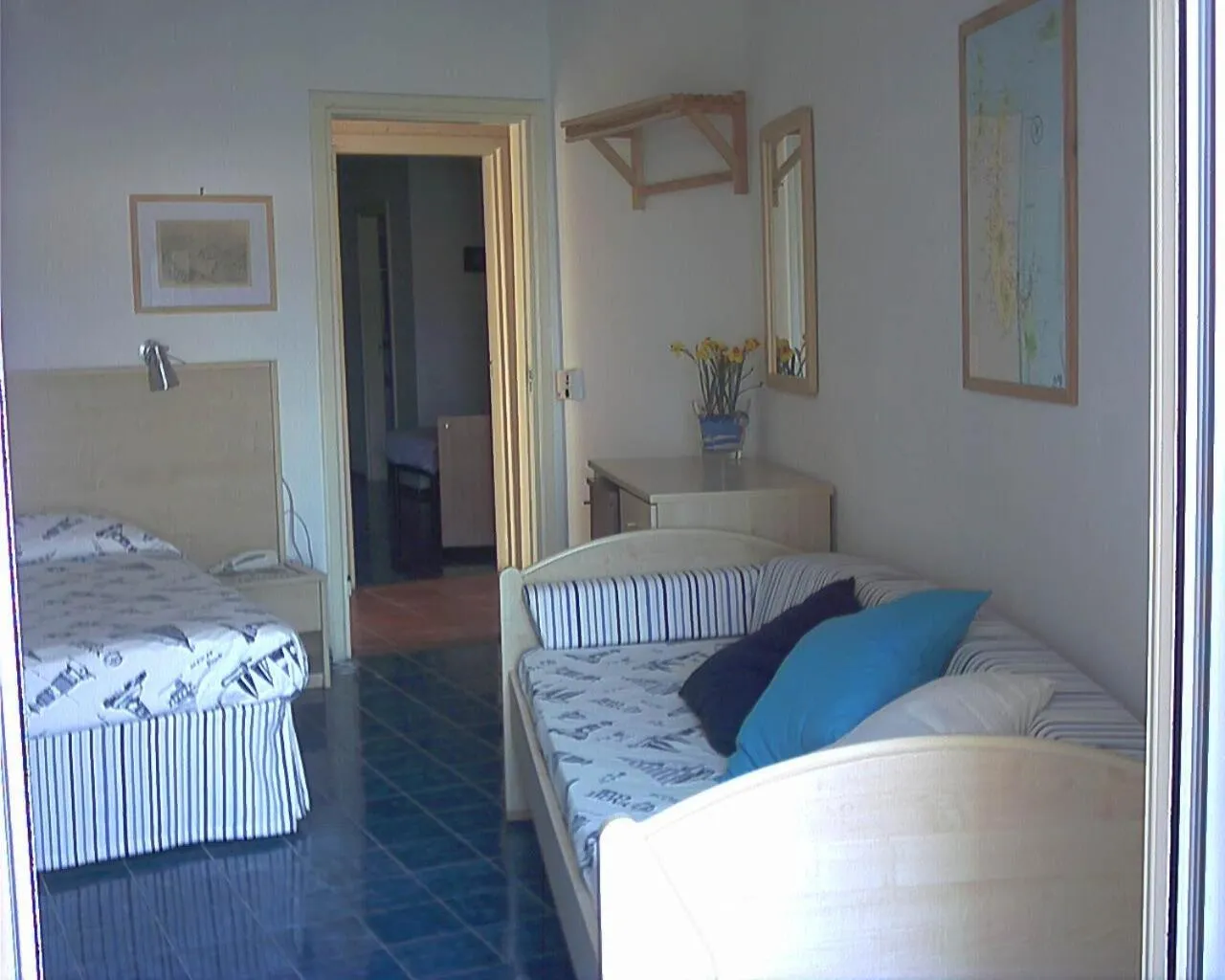 Bedroom in Hotel La Baia