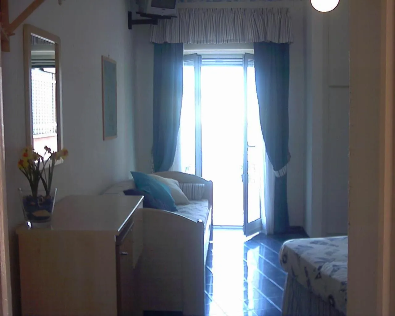 Bedroom in Hotel La Baia
