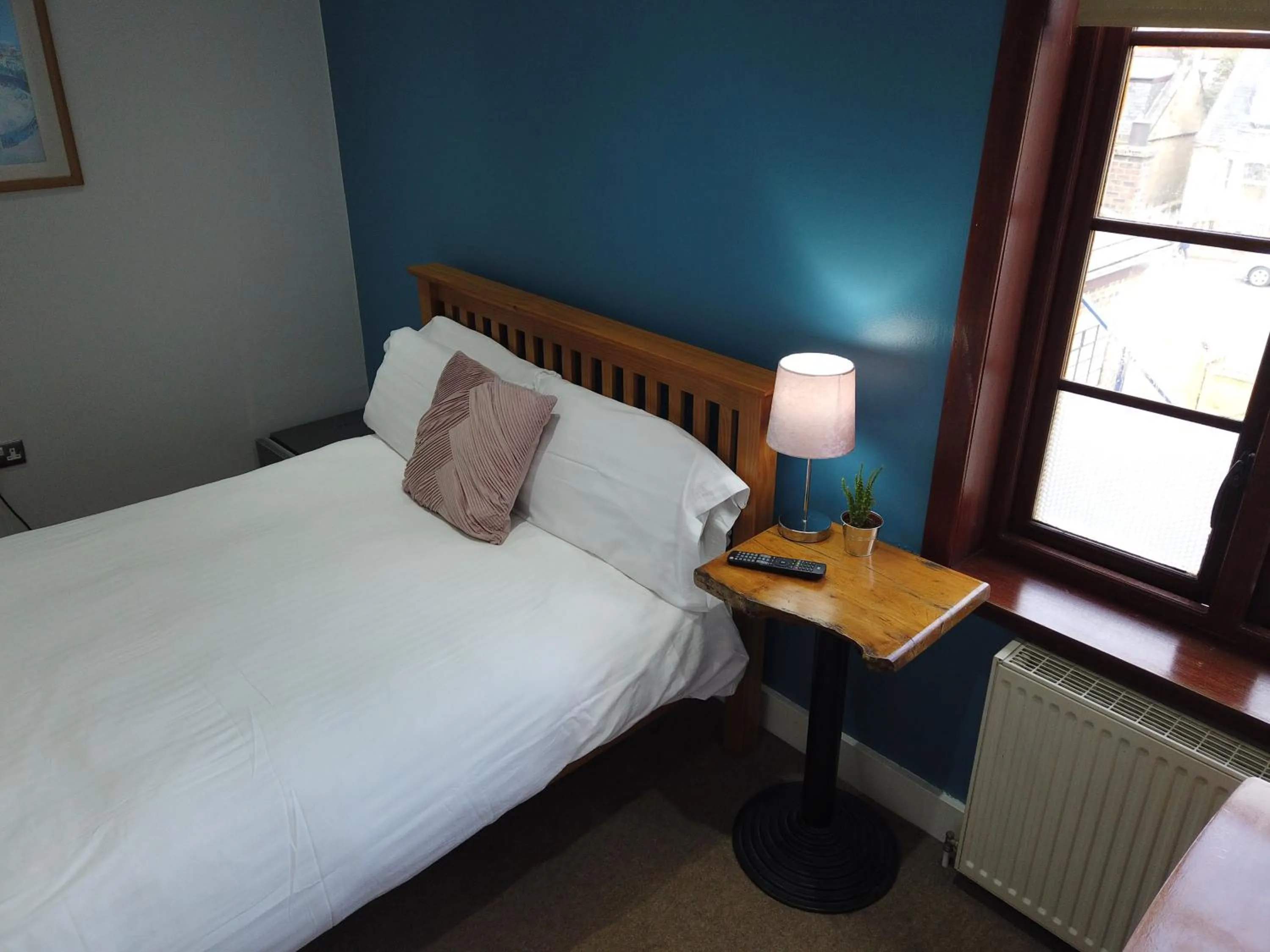 Bed in The Orchard Hotel