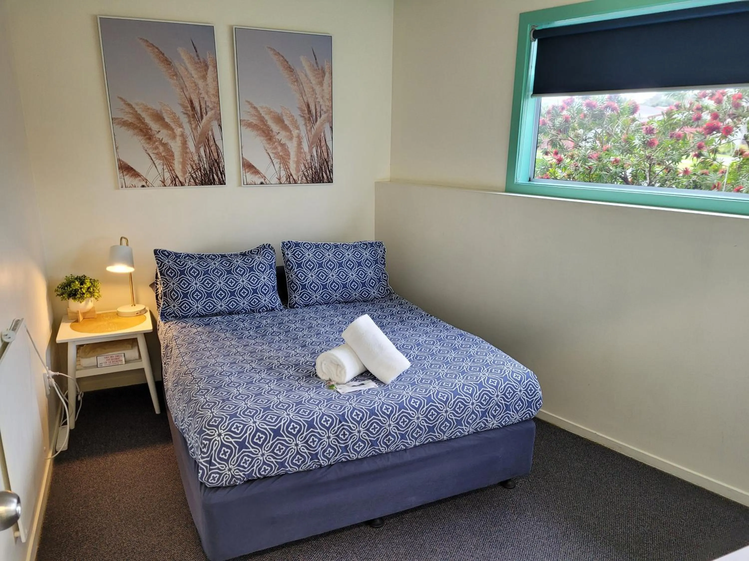 Photo of the whole room, Bed in Pacific Coast Lodge and Backpackers