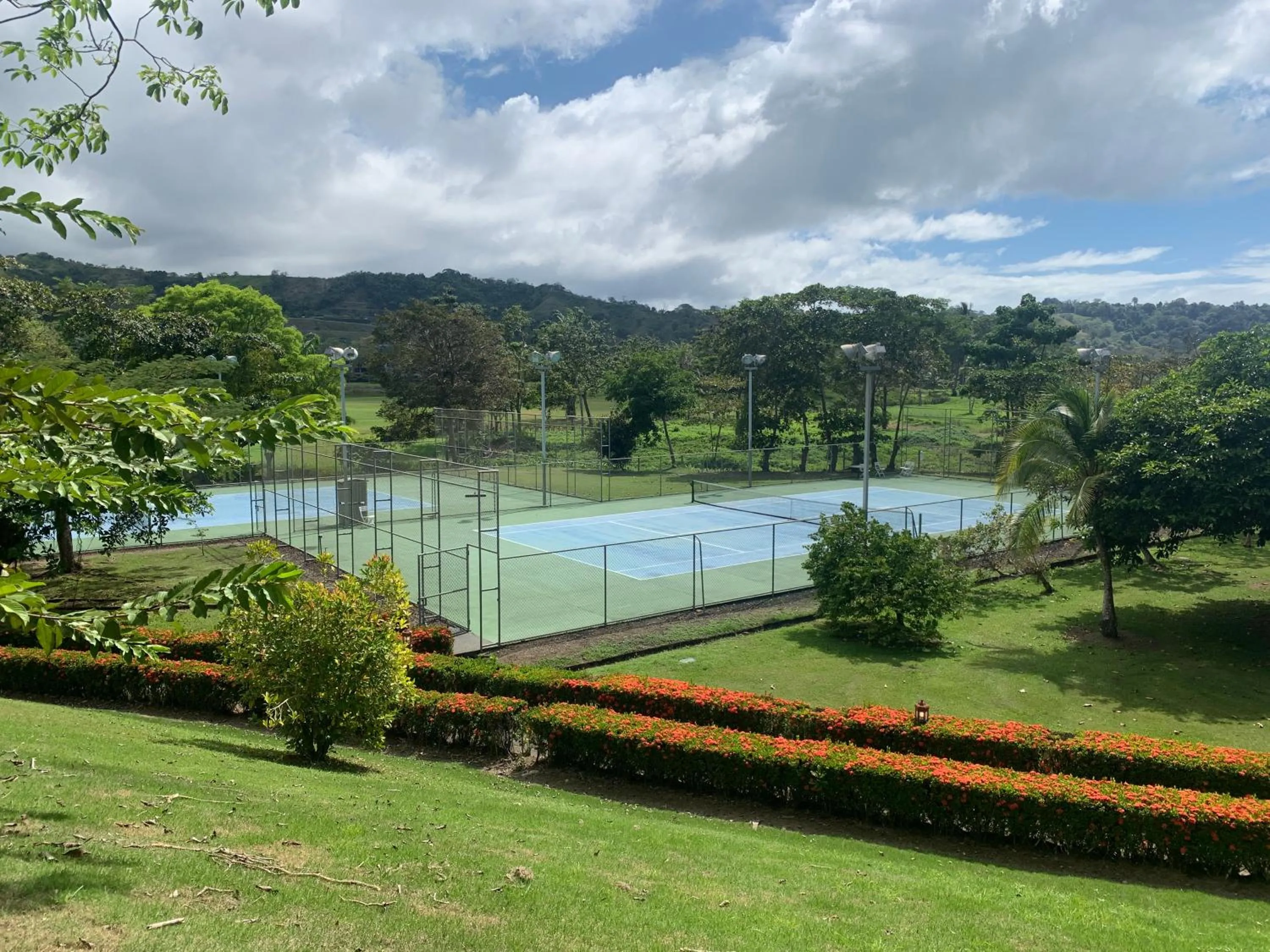 Tennis court in Stay In CR Los Sueños Condos