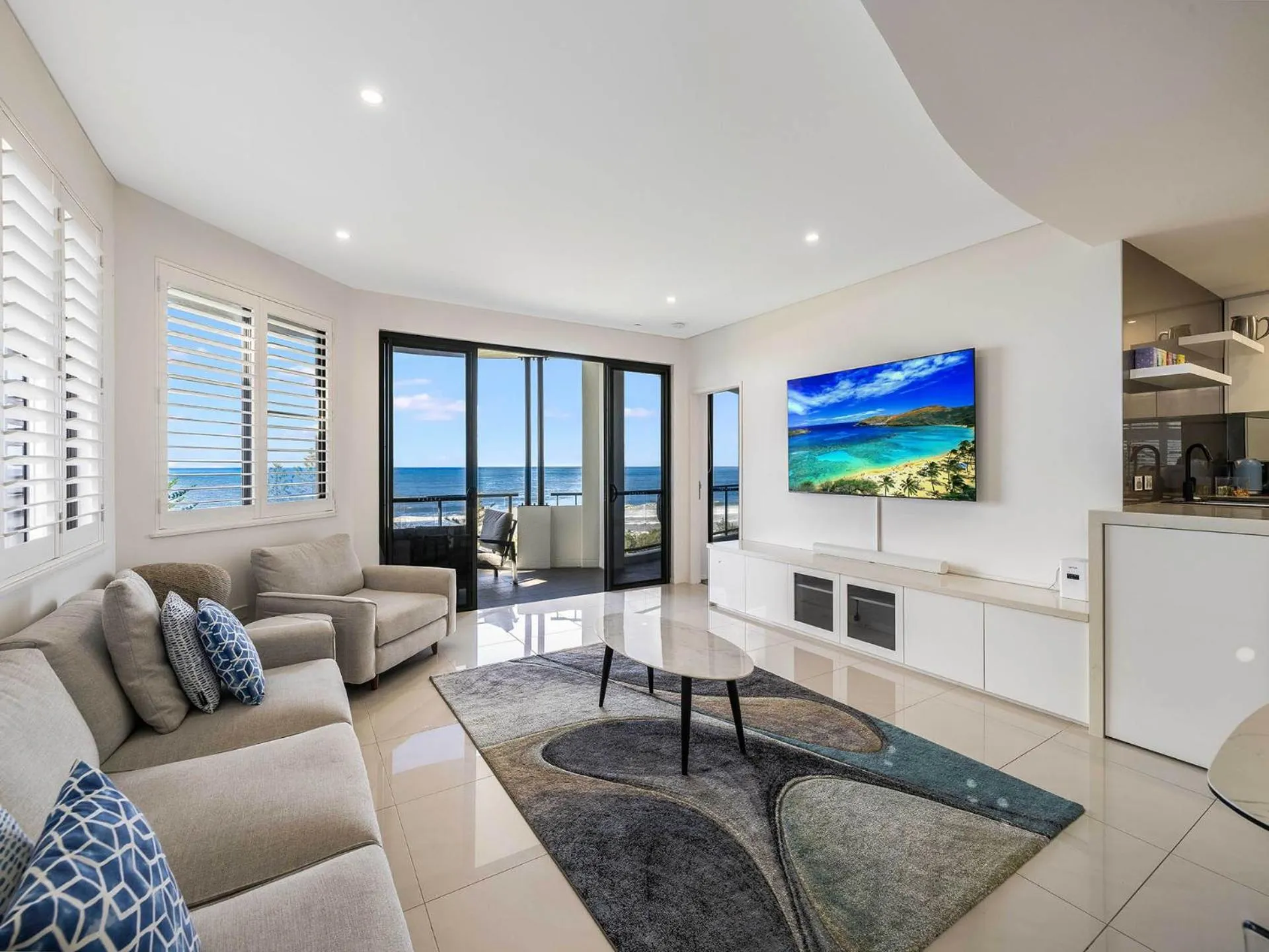 Communal lounge/ TV room in Meridian Alex Beach Apartments