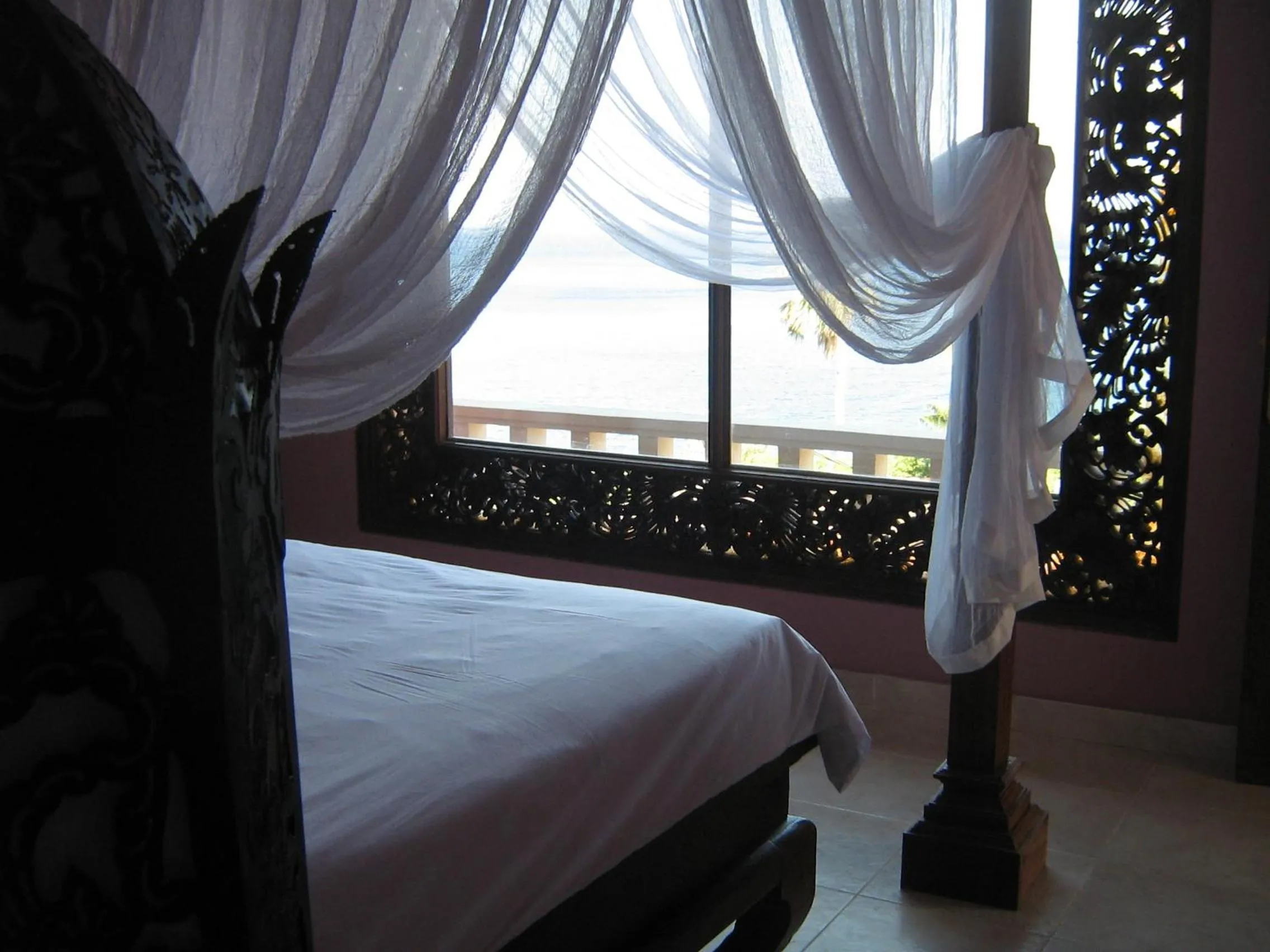 Bed in Baliku Dive Resort