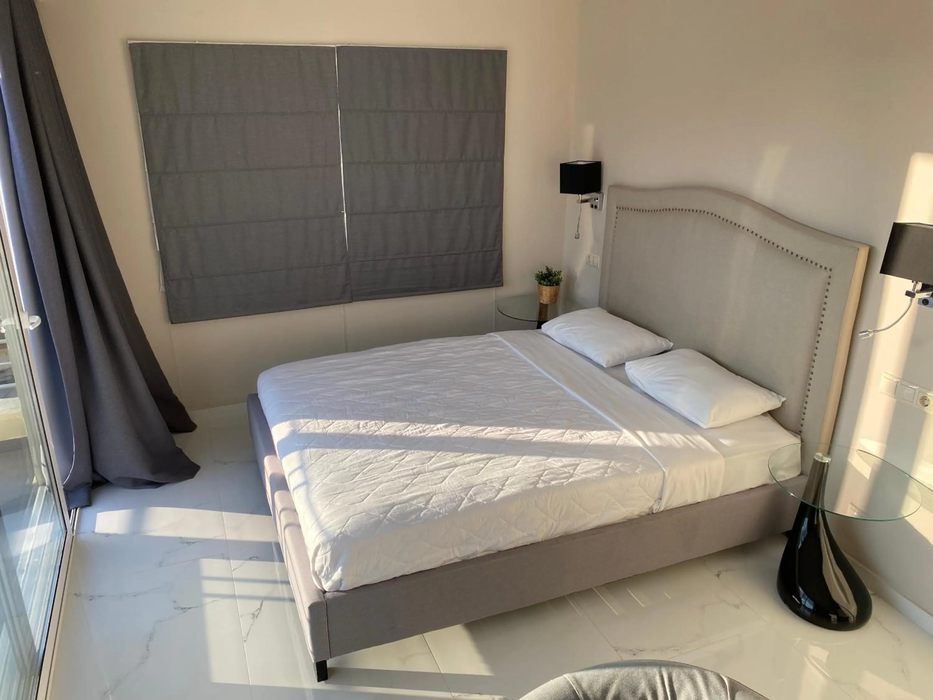 Bed in 24K Athena Suites