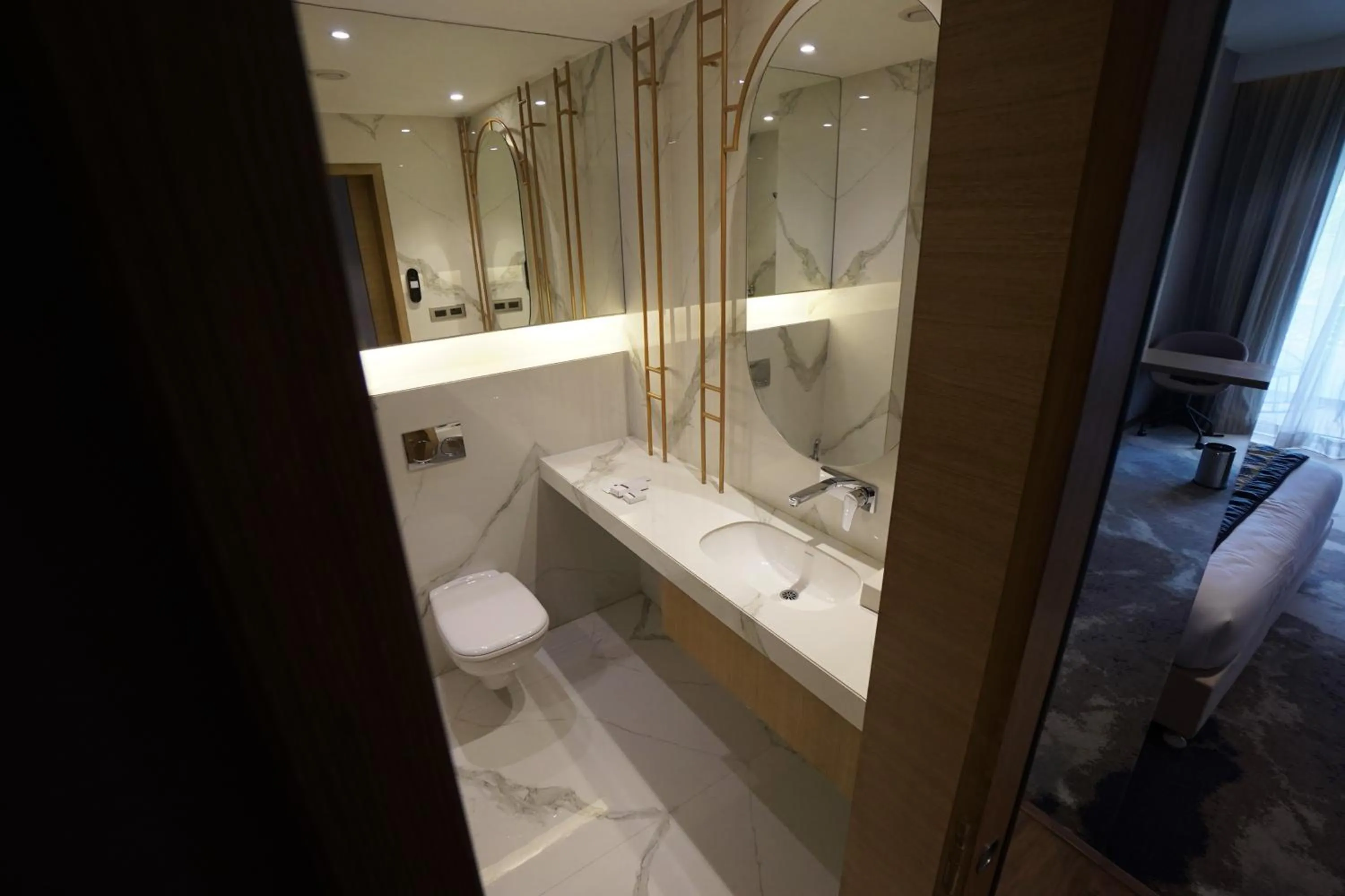 Shower in Clarks Inn Suites Raipur