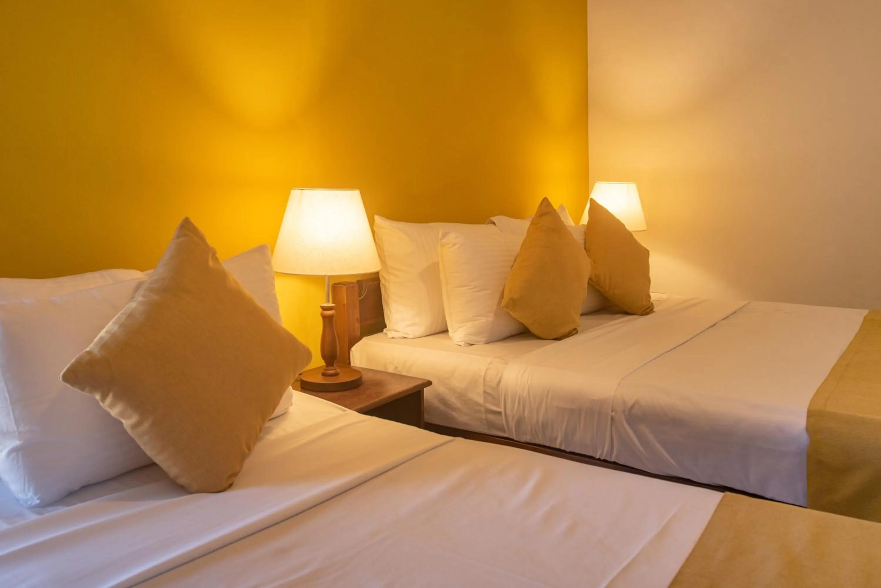 Bed in Ceyloni Lake Residency