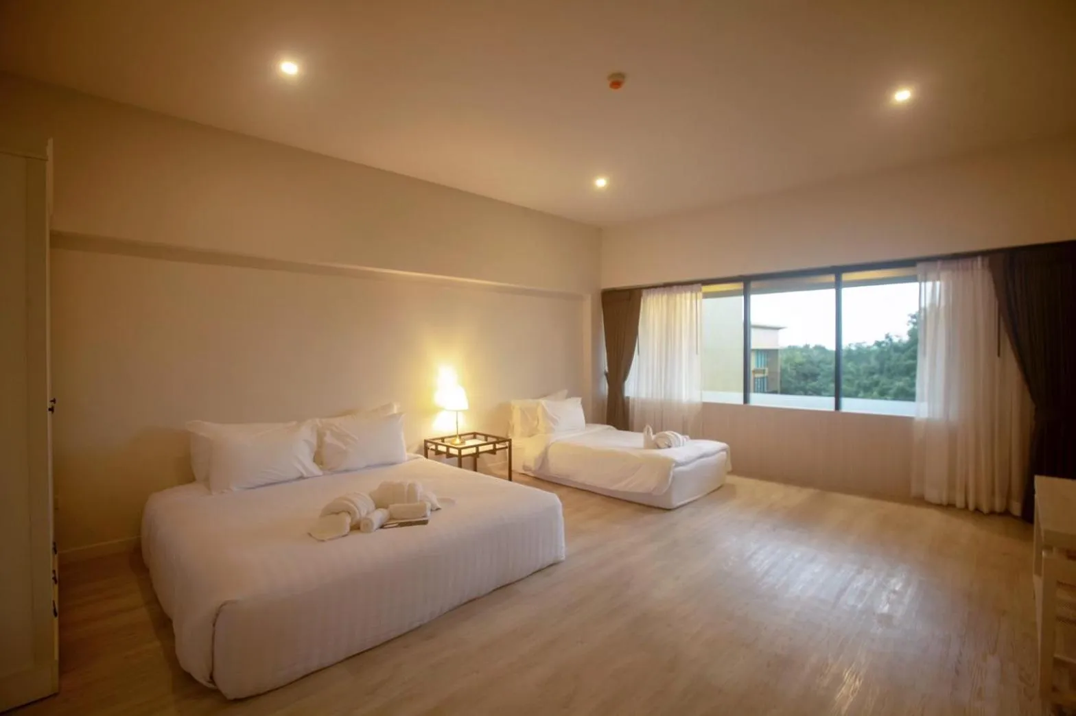 Bed in TREX Buriram Boutique Hotel