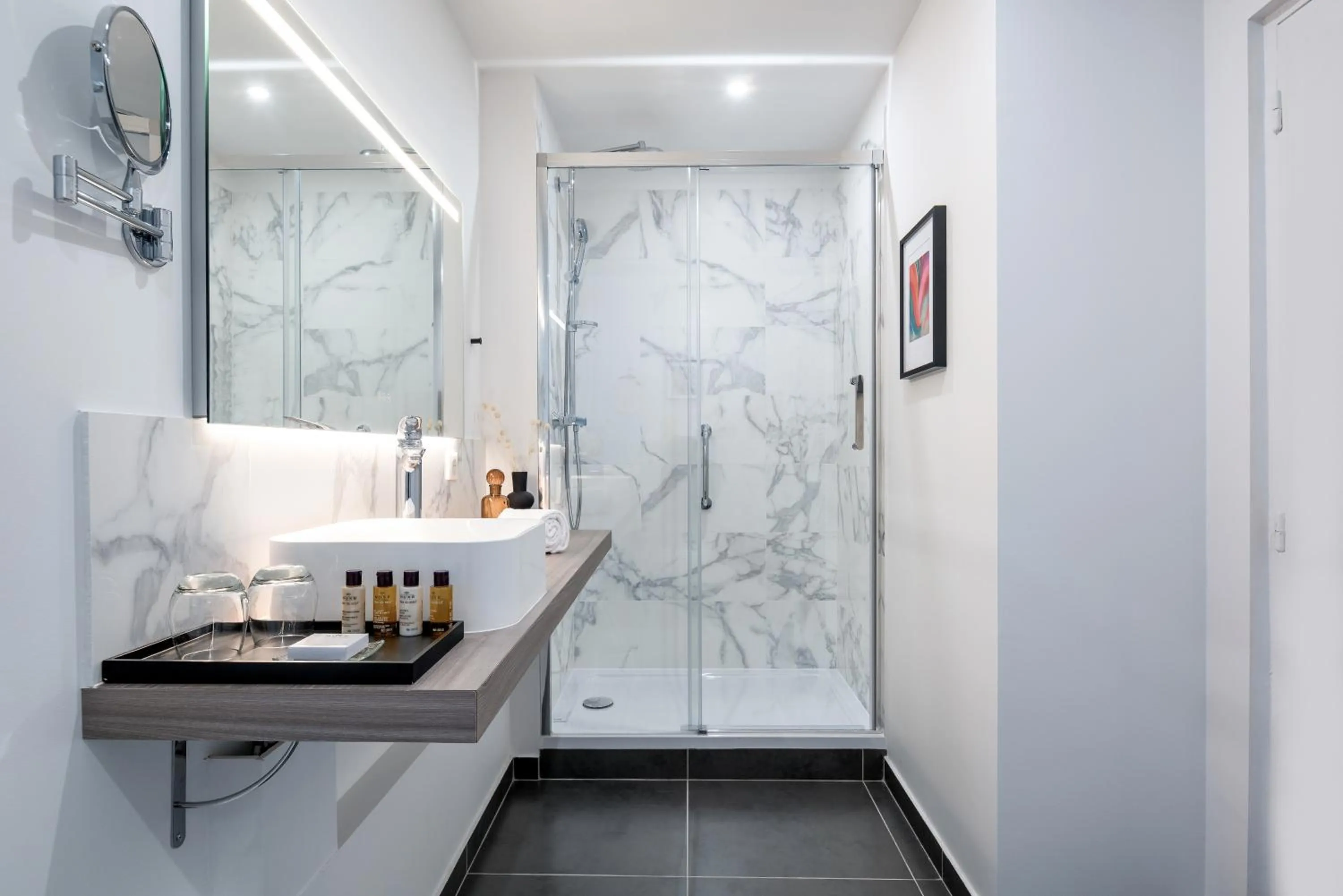 Bathroom in Hotel Camille Paris Tapestry Collection by Hilton