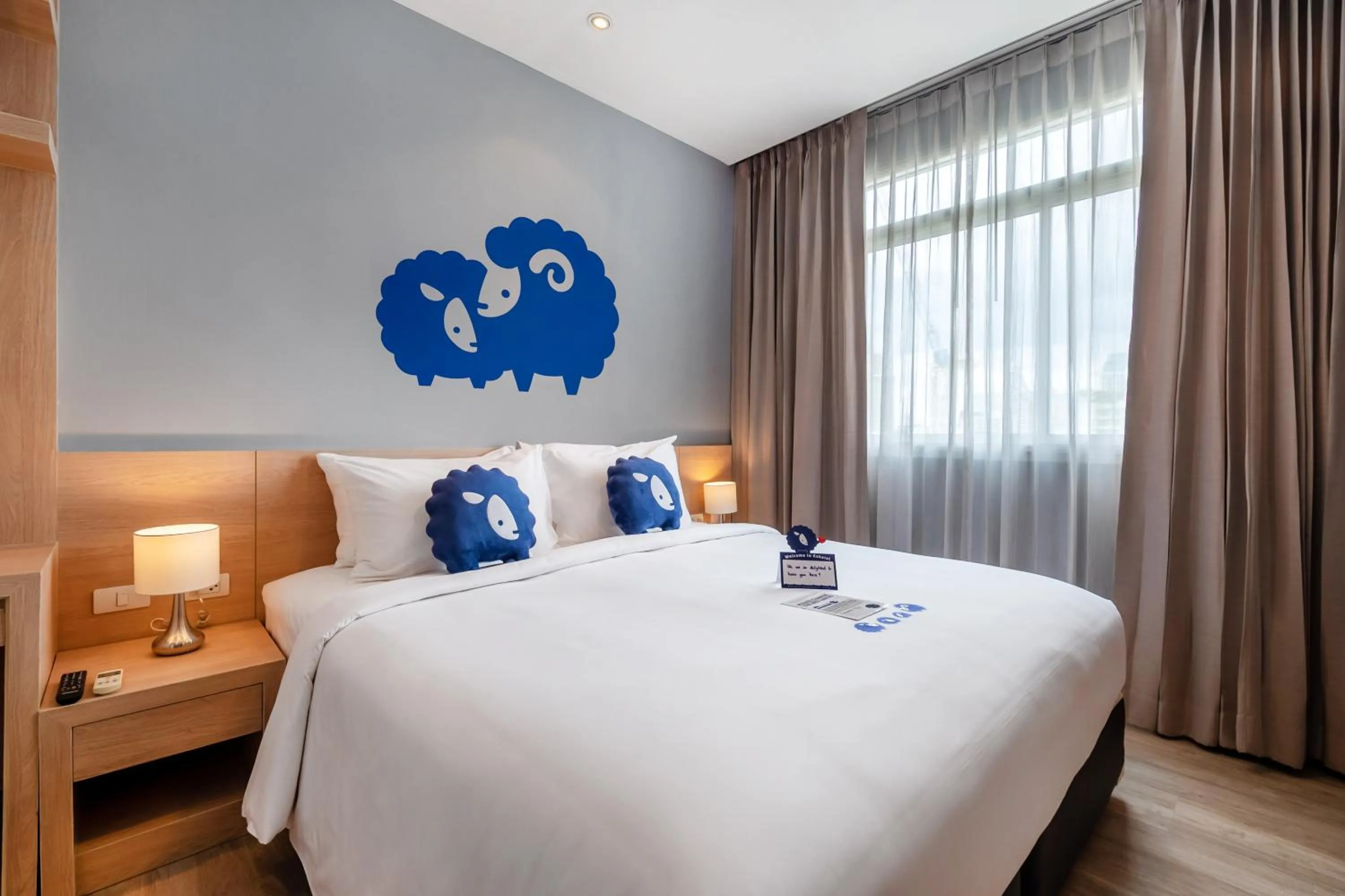 Bed in Kokotel Bangkok Dheva Thonglor