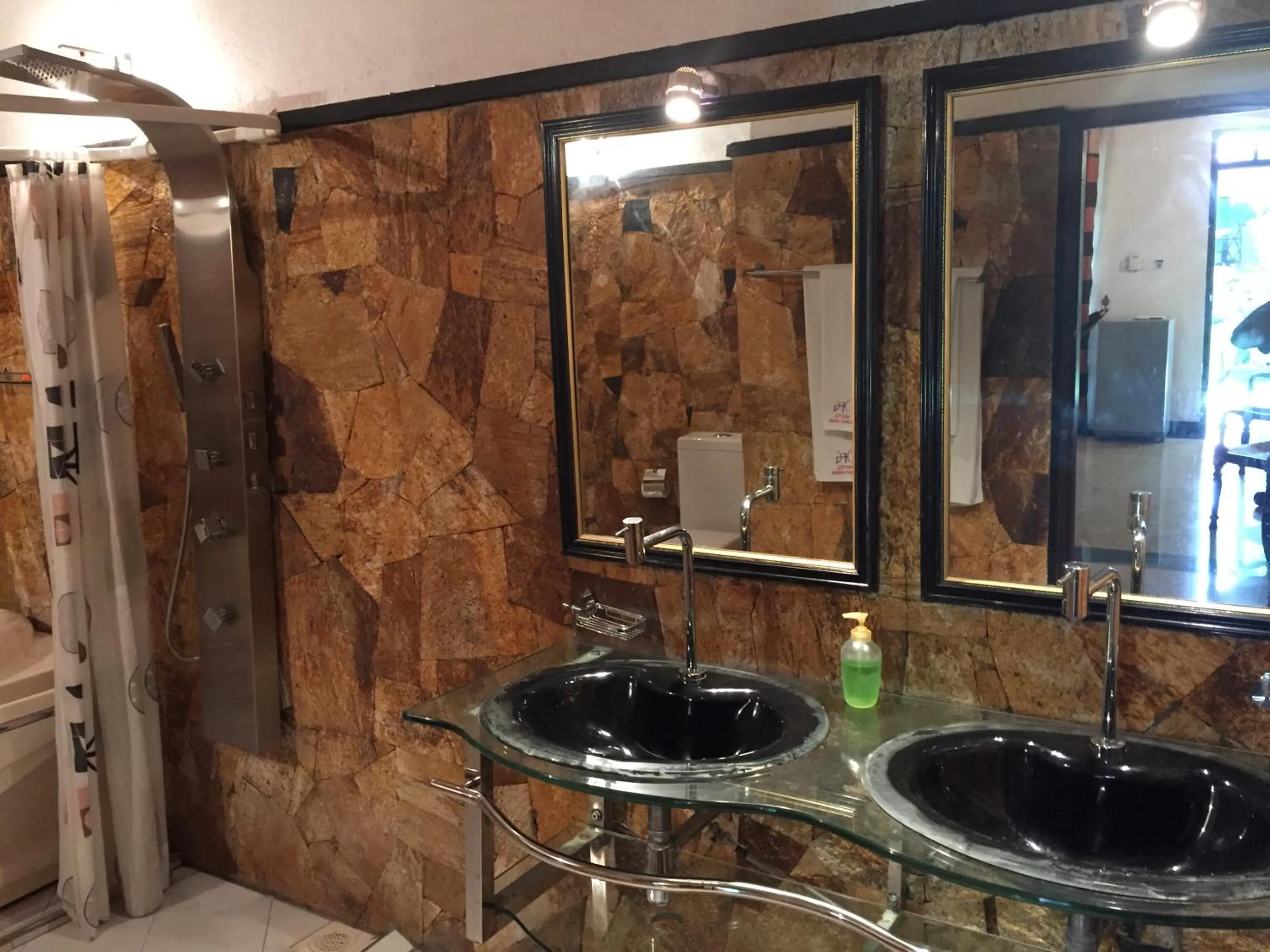 Bathroom in Hotel Flower Garden