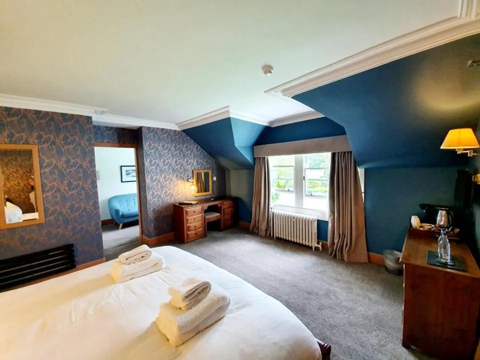 Bed in Achray House Restaurant with Rooms