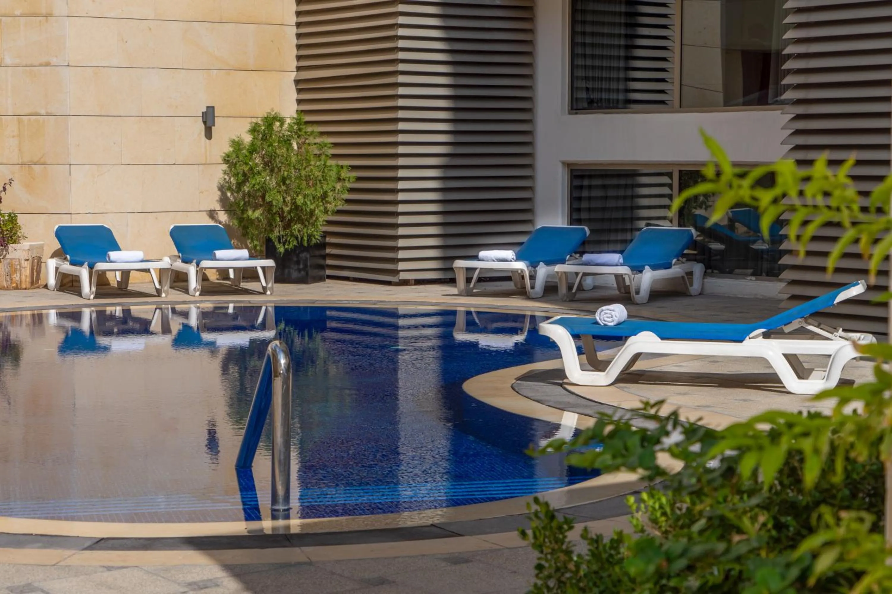 Swimming pool in Corp Amman Hotel