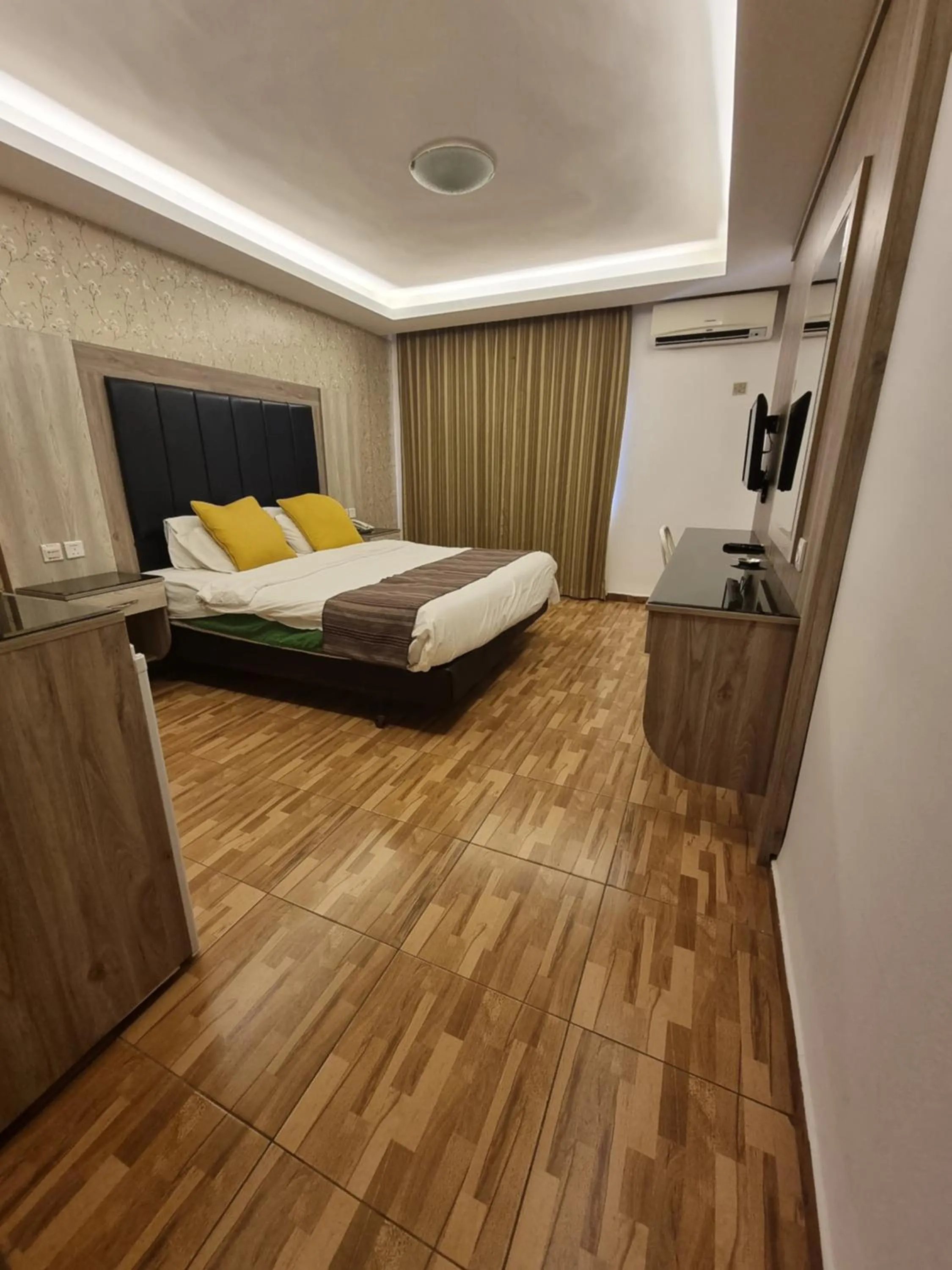 Bed in Shweiki International Hotel