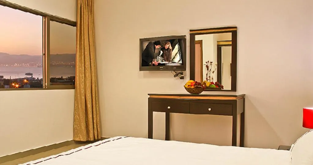 Bed in Golden Rose Hotel