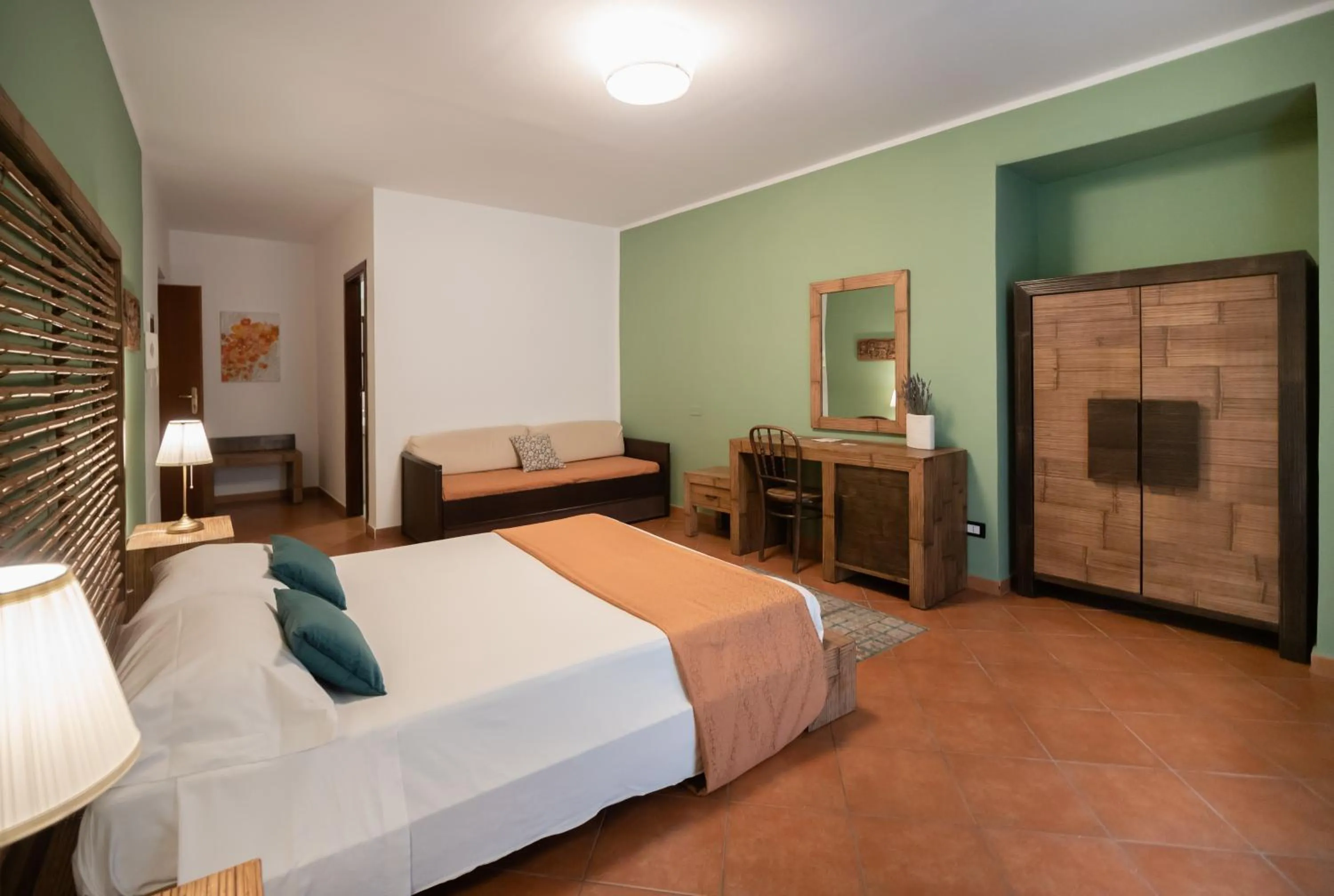 Bed in Kalamarina Rooms