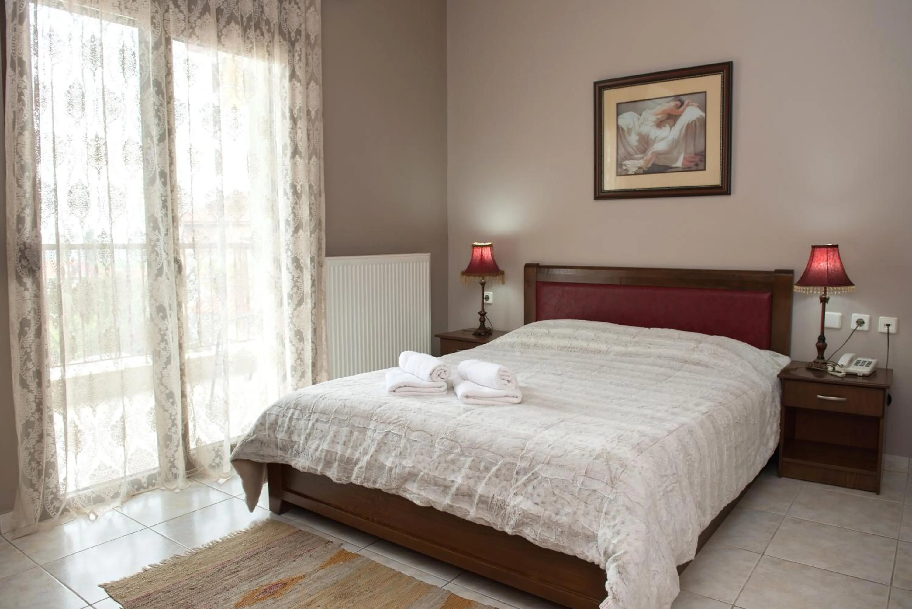 Bed in Hotel Philippion