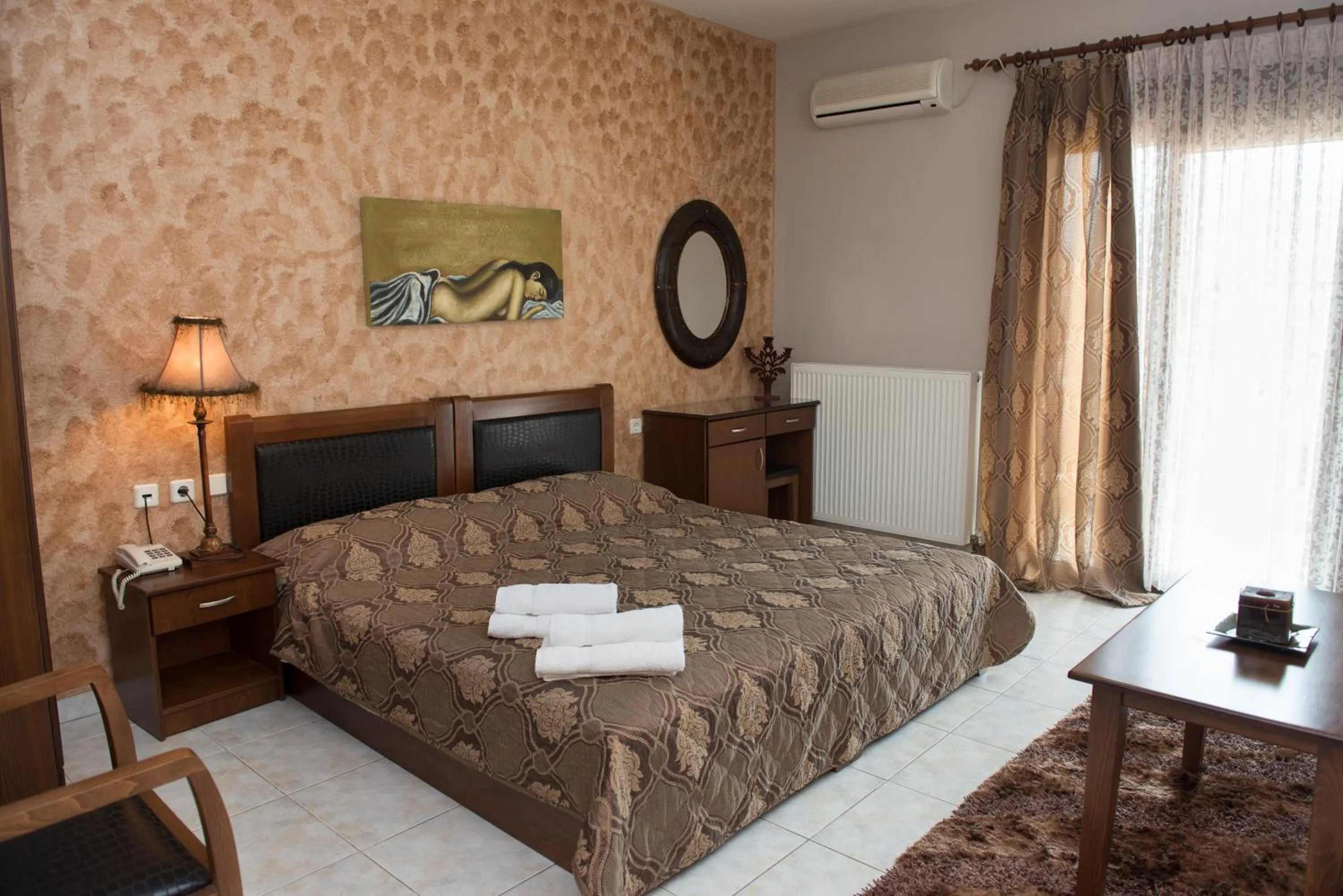 Bed in Hotel Philippion